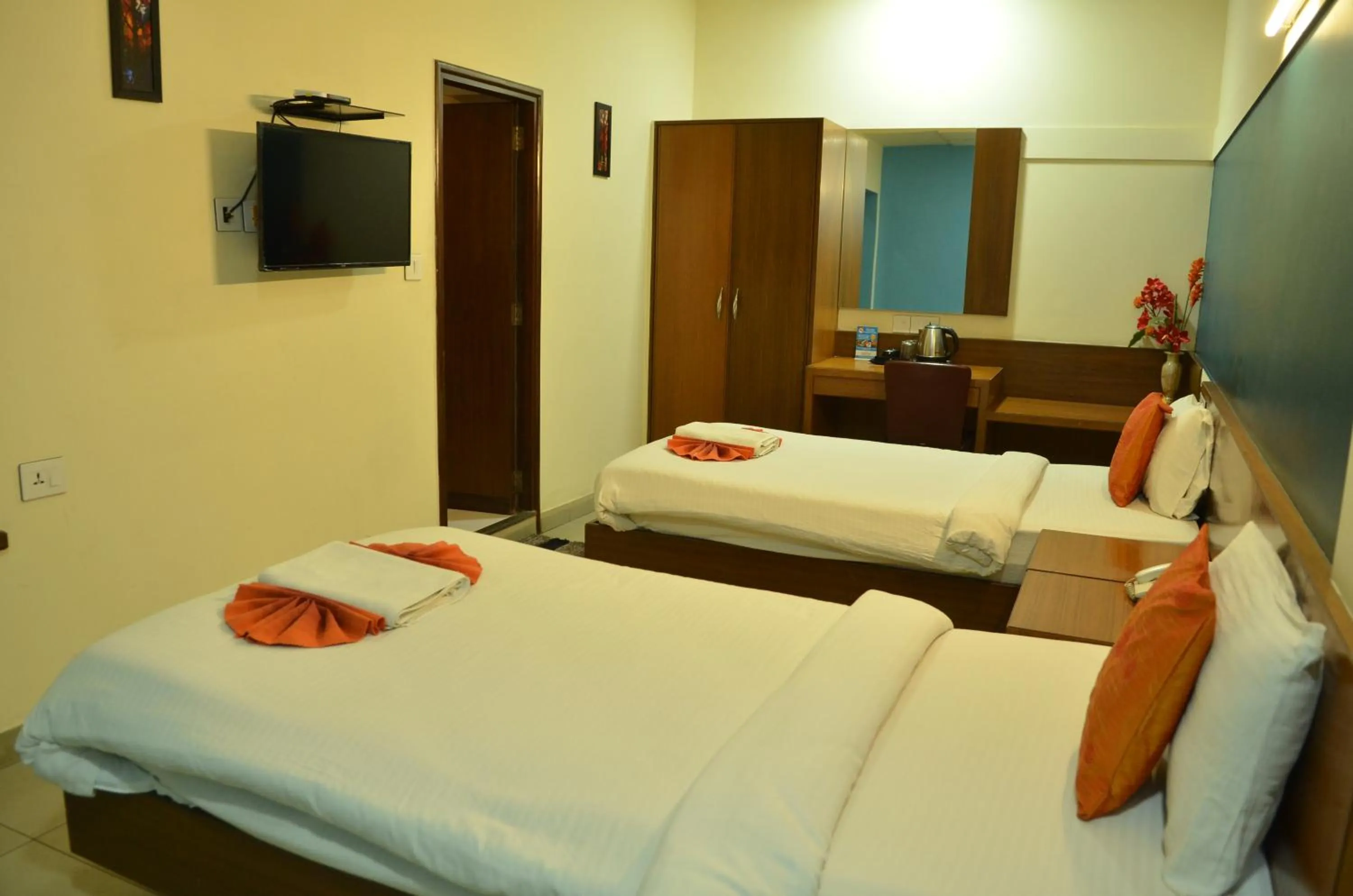 Bed in Cubbon Suites