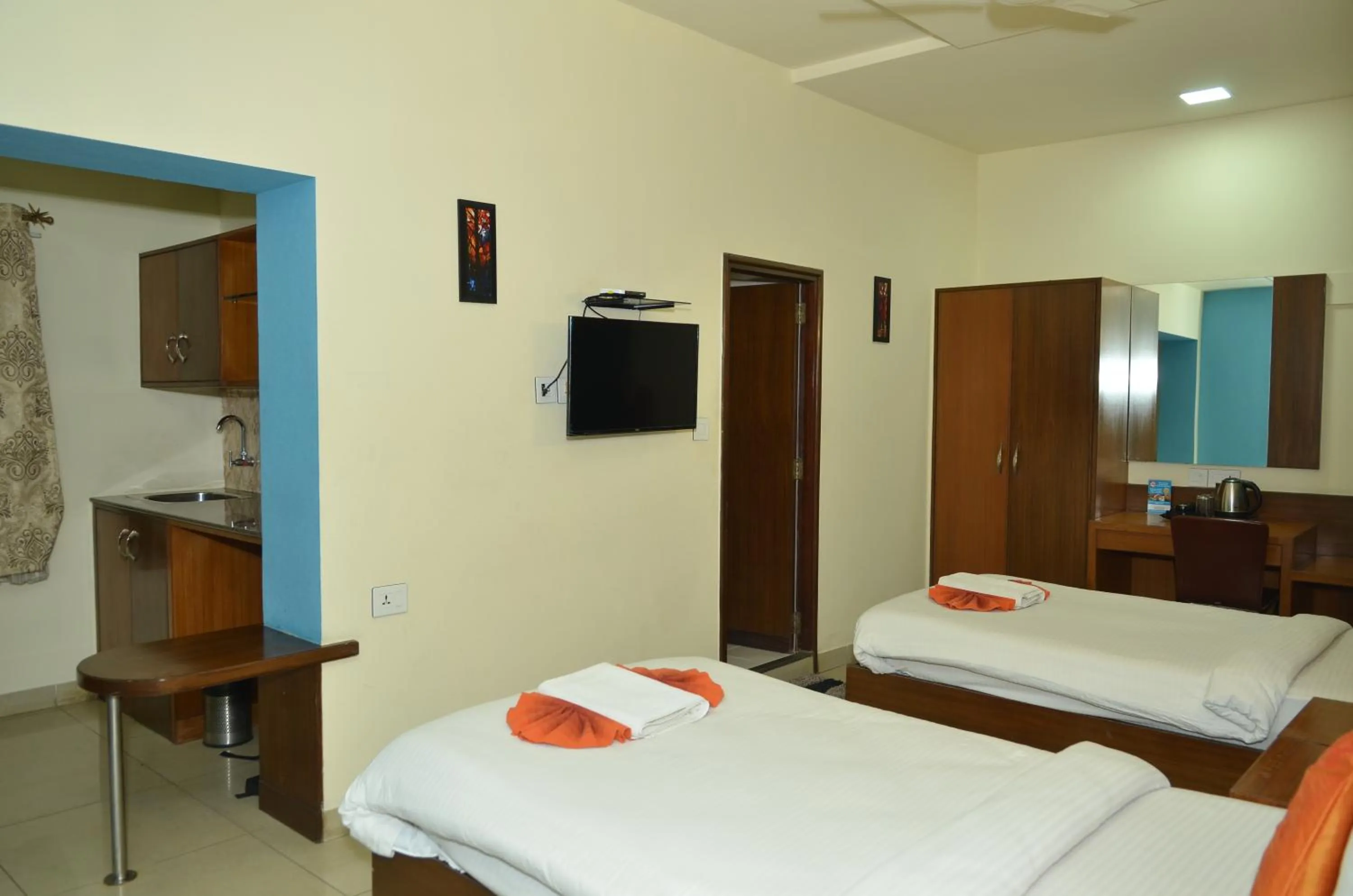 Bed in Cubbon Suites