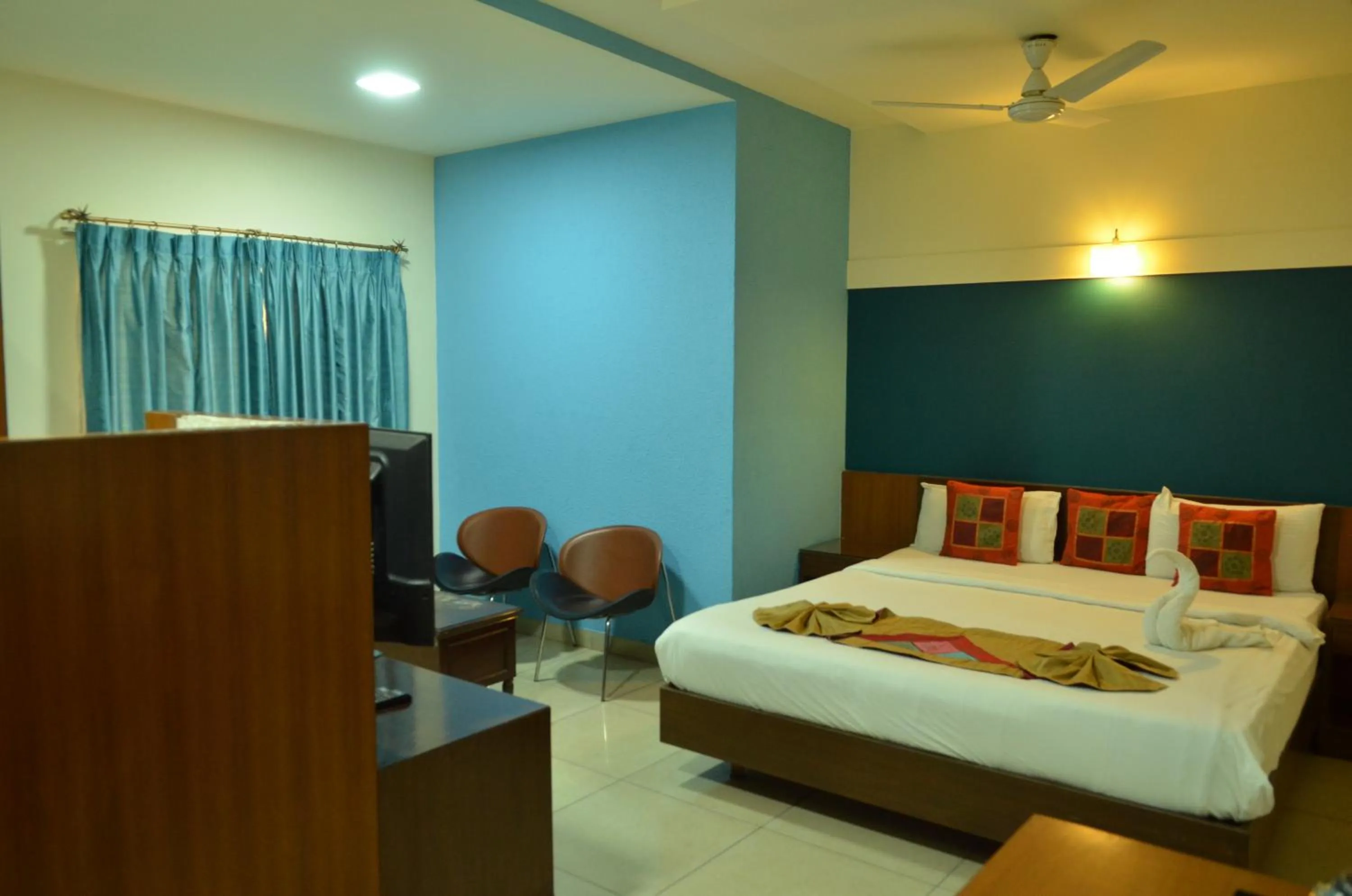 Bed in Cubbon Suites