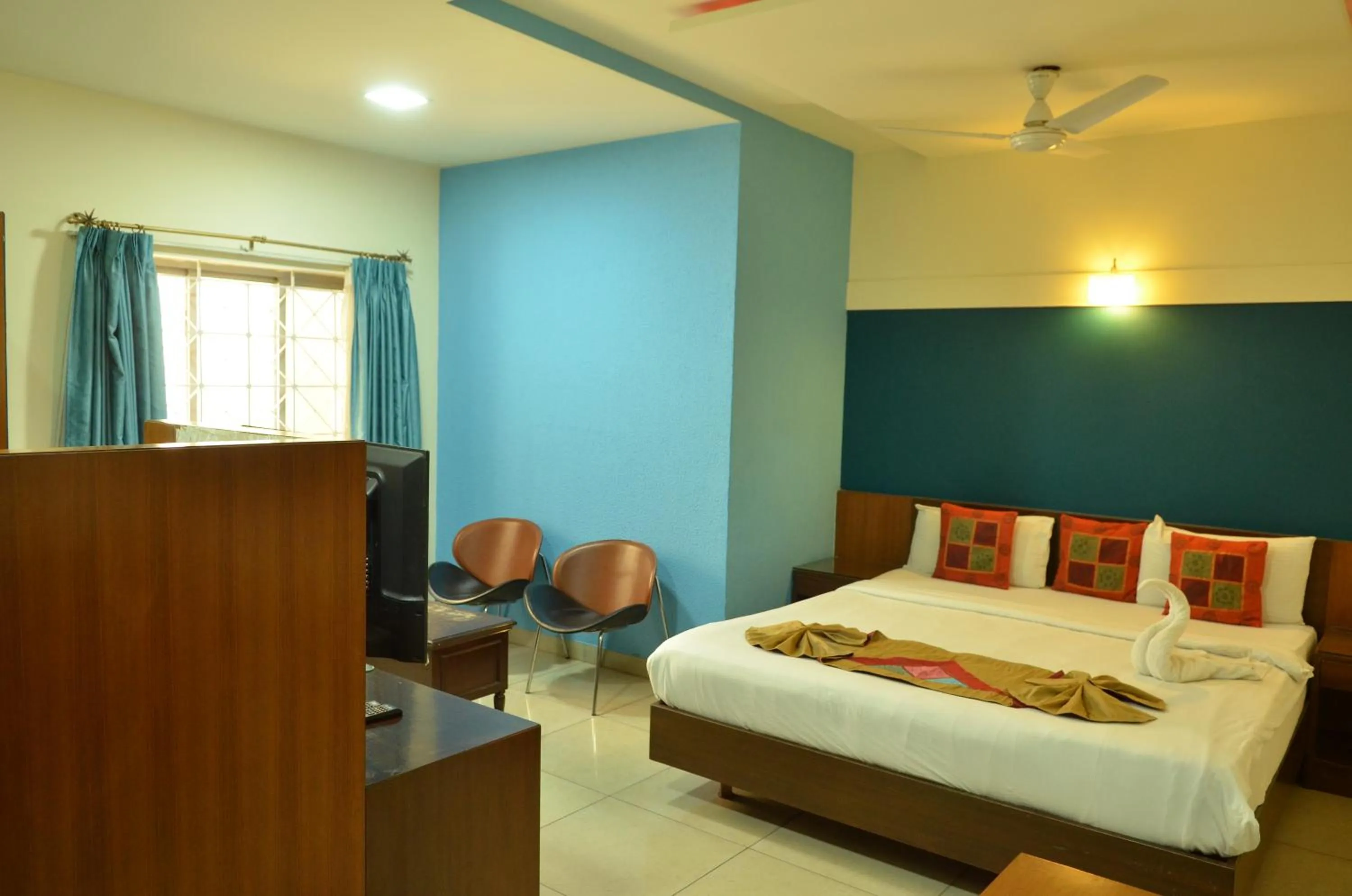 Bed in Cubbon Suites