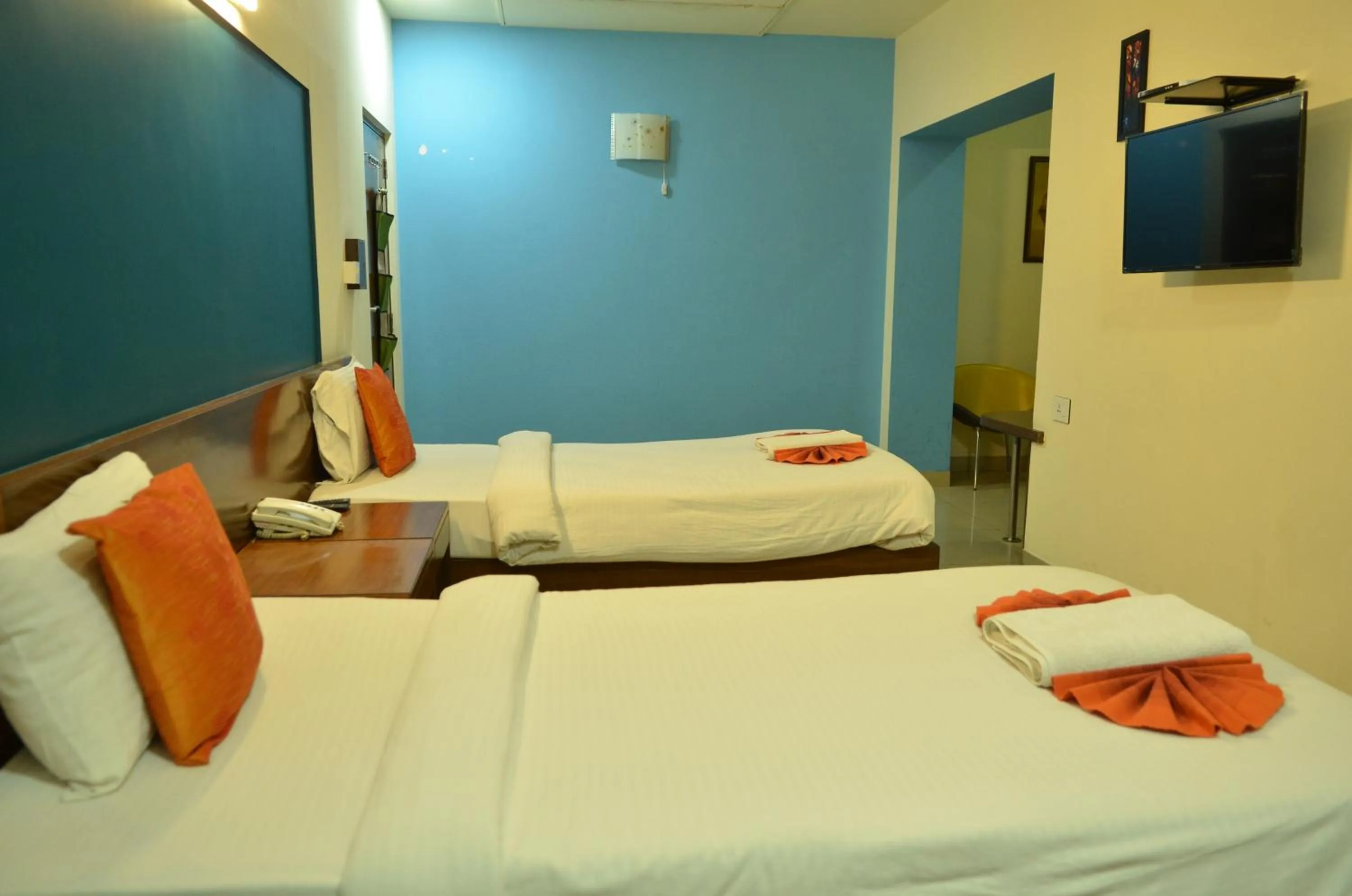 Bed in Cubbon Suites