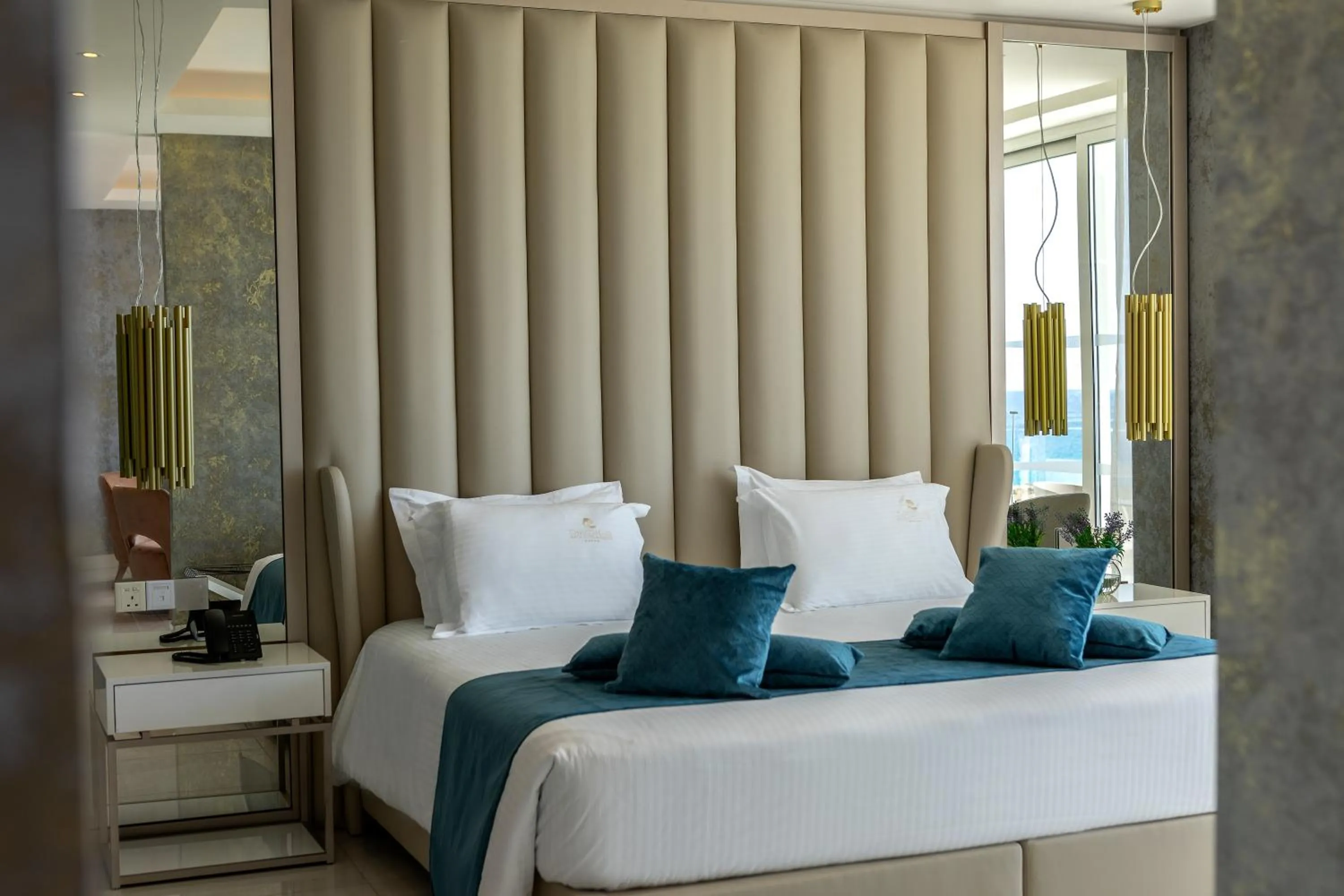 Bed in Chrysomare Beach Hotel & Resort