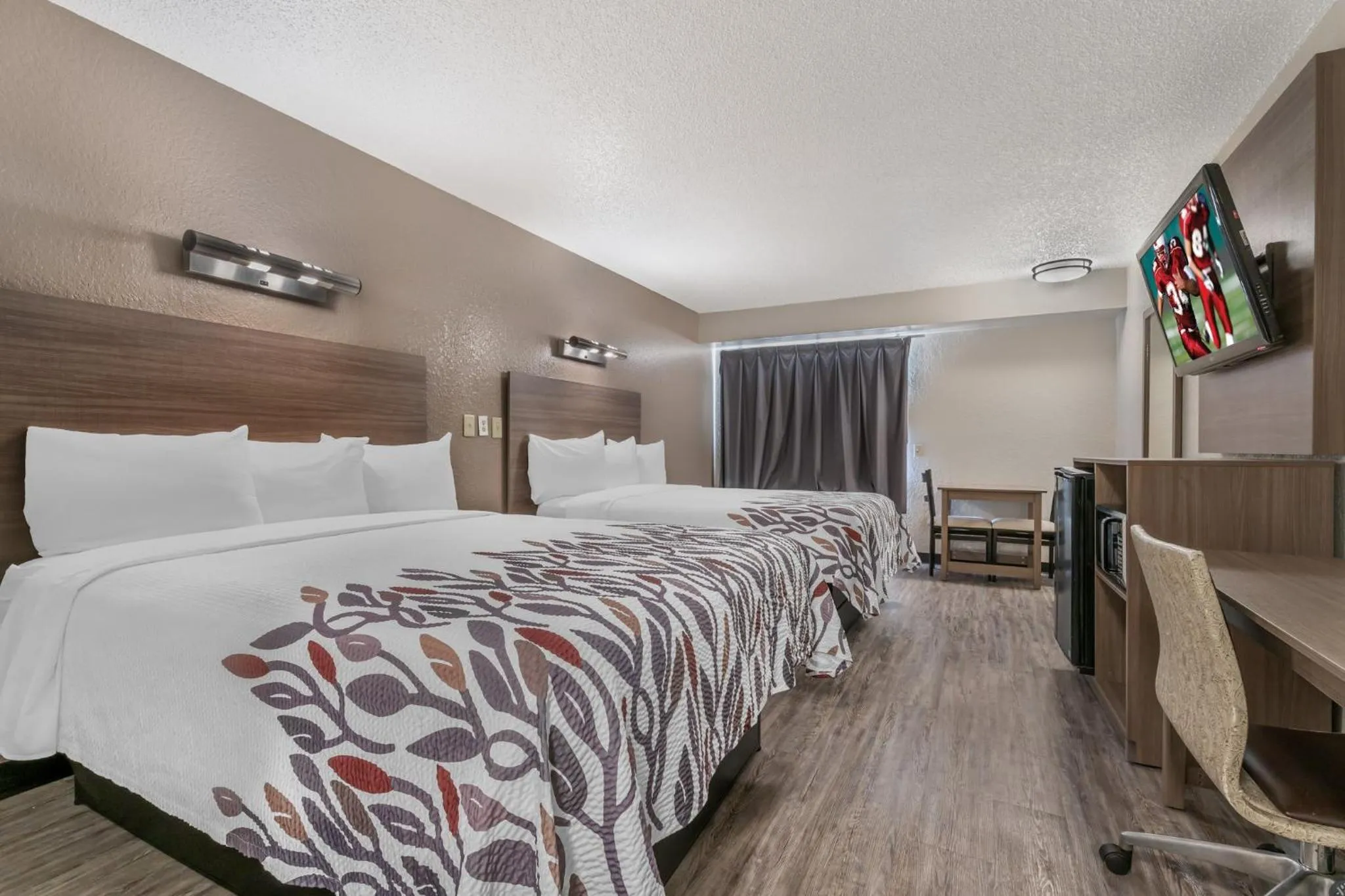 Photo of the whole room, Bed in Red Roof Inn Houston Brookhollow