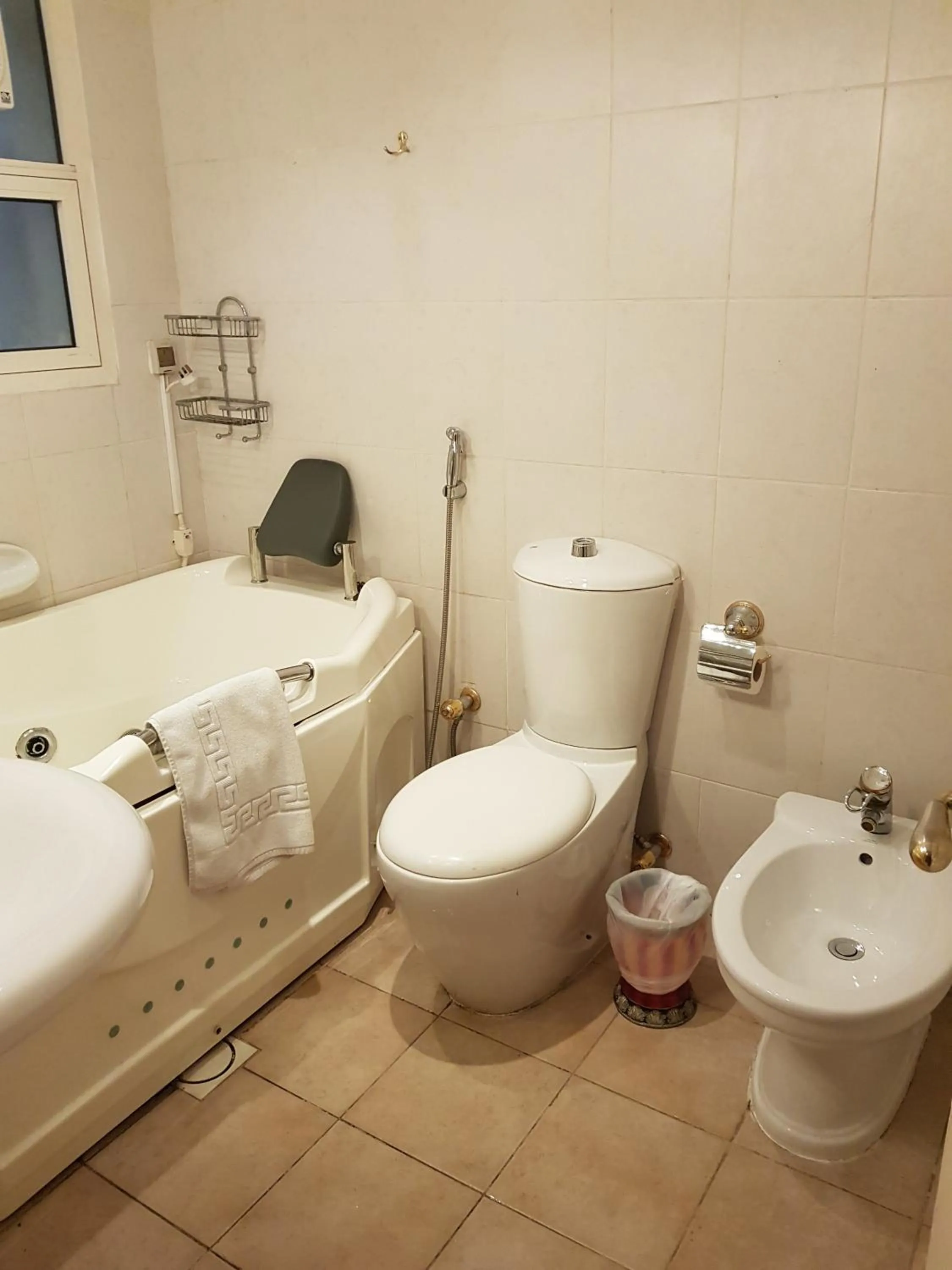 Bathroom in Al Jazeera Hotel Apartments LLC