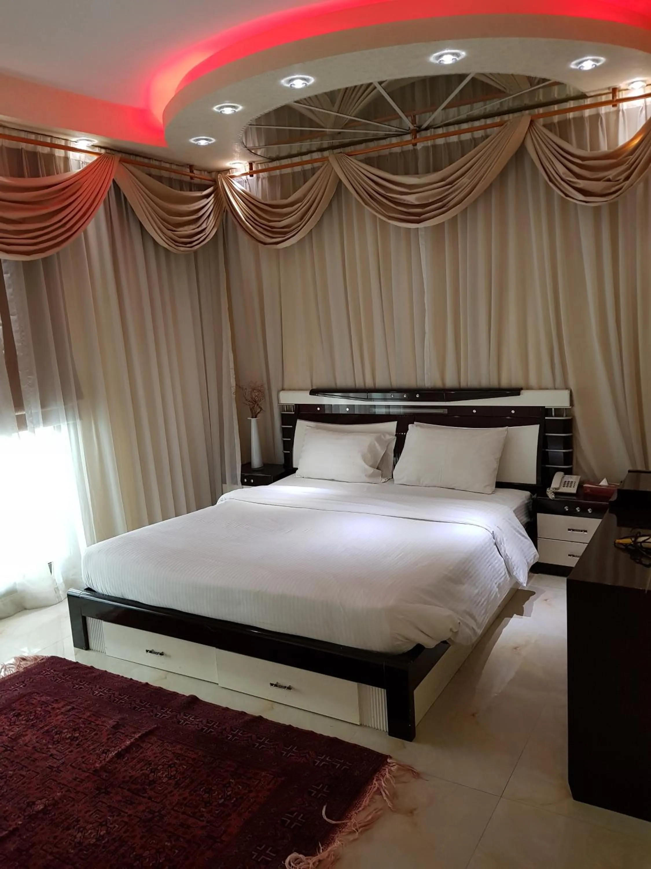 Bedroom in Al Jazeera Hotel Apartments LLC