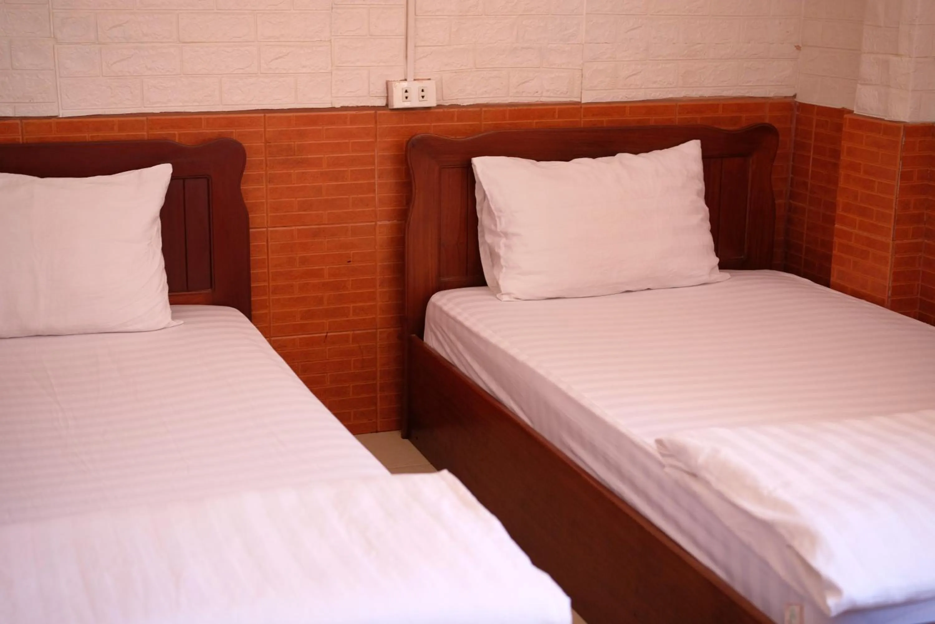 Bed in Intouch Guest House