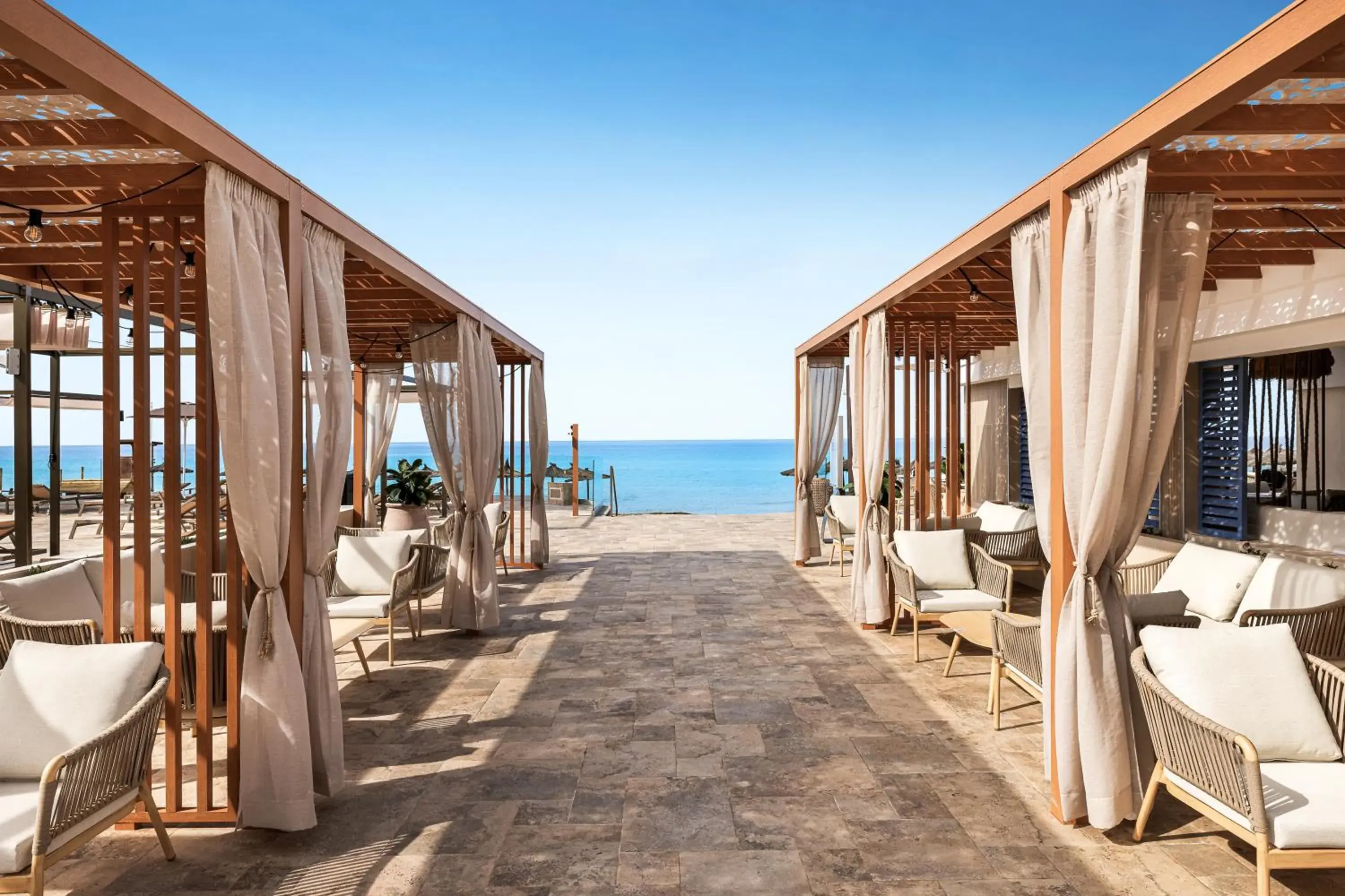 Lounge or bar in Hotel Riu Palace La Mola Lounge or bar in Hotel Riu Palace La Mola