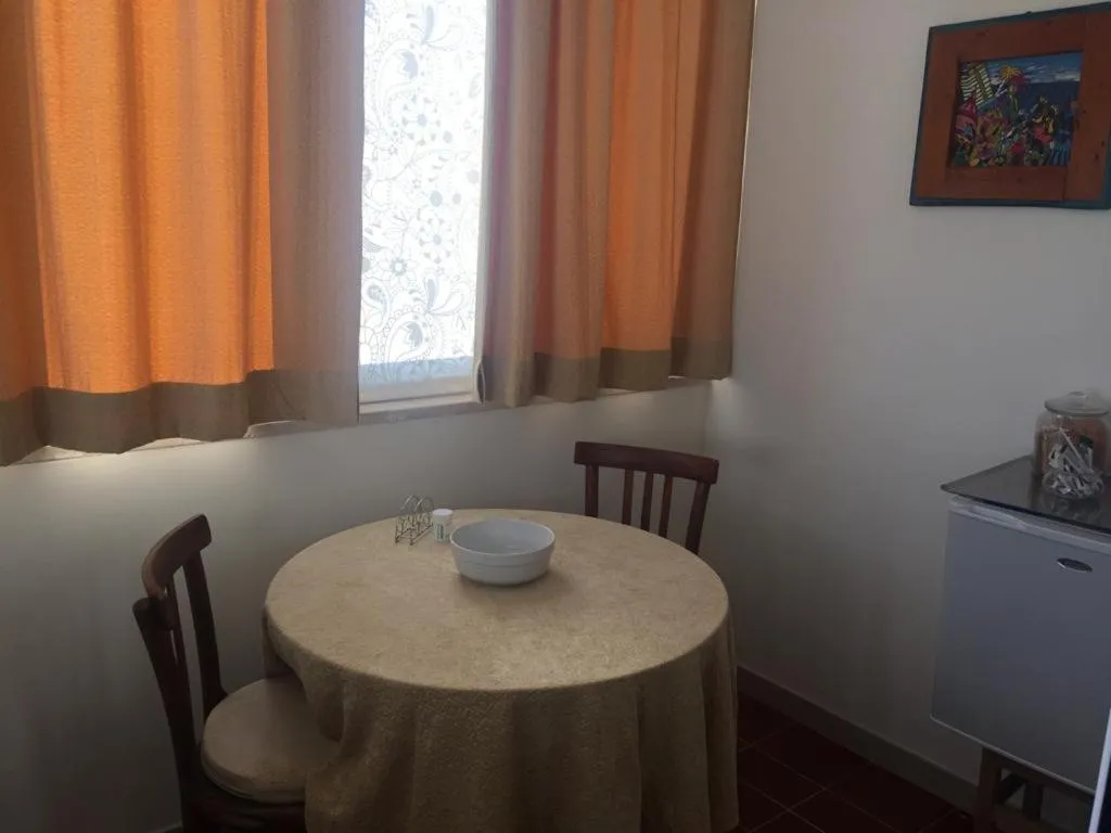 Dining area in La Casa di Emanuella - Rooms & International Suites