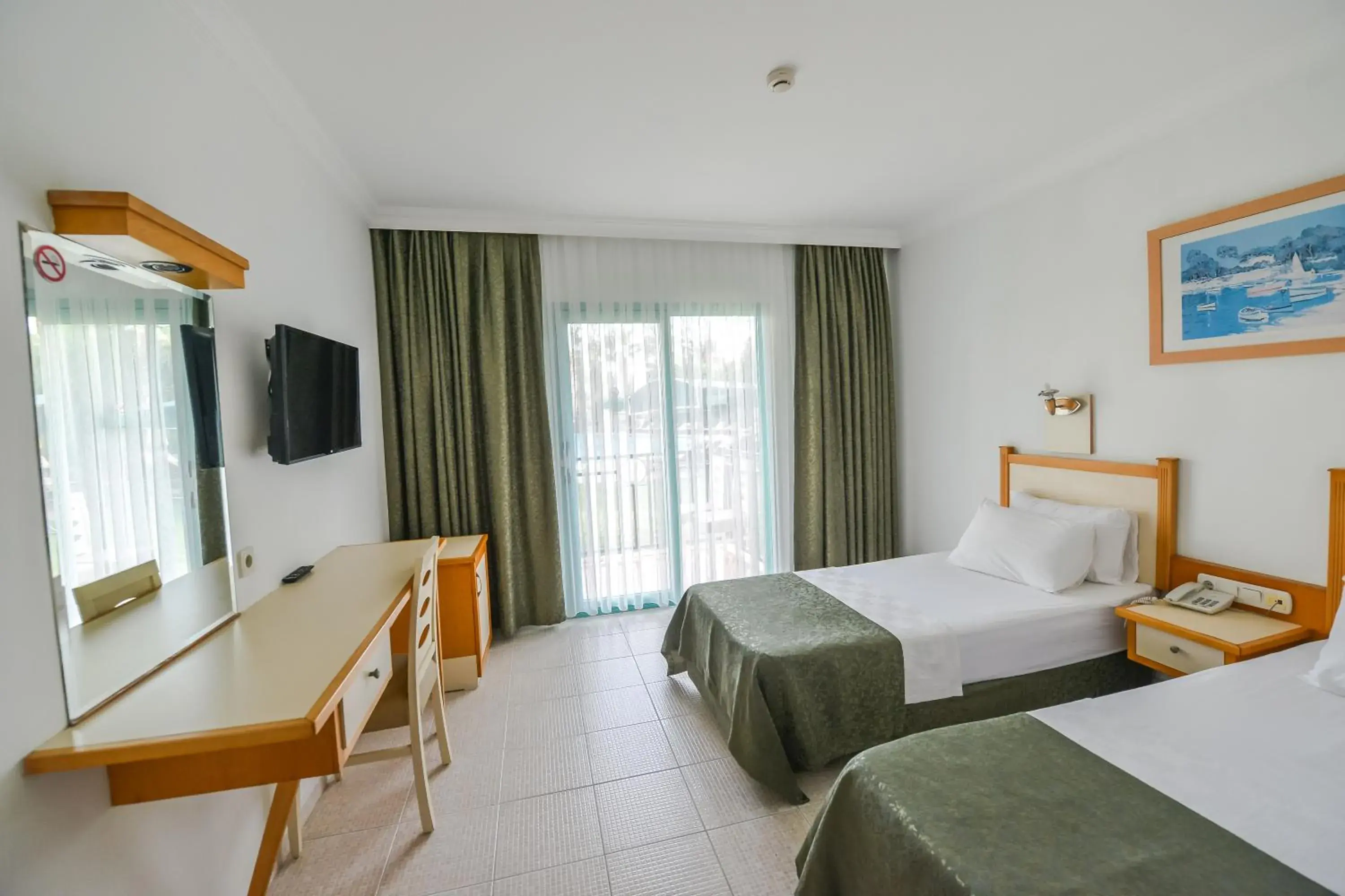 Bed in Rebin Beach Hotel Bed in Rebin Beach Hotel