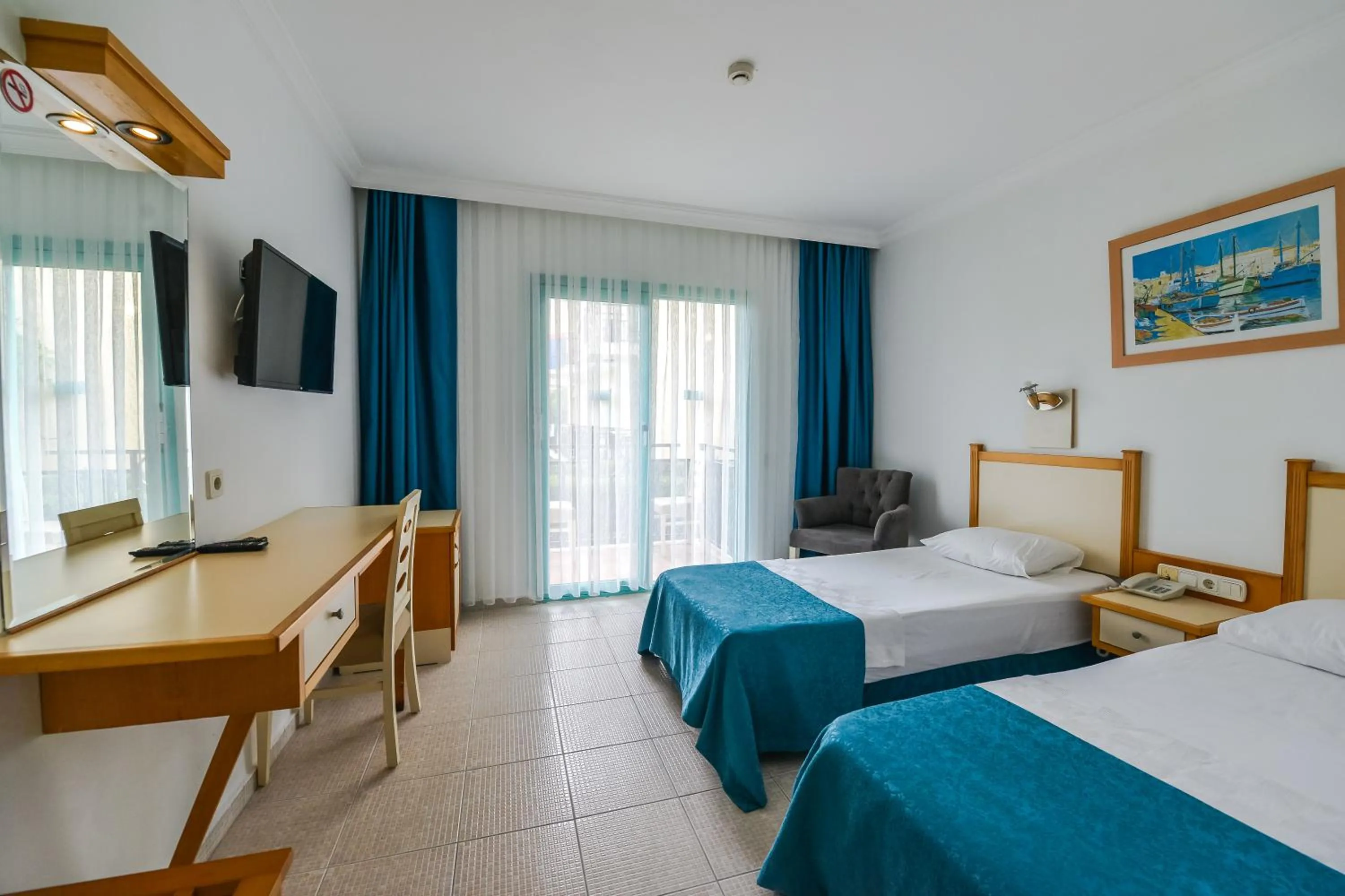 Bed in Rebin Beach Hotel