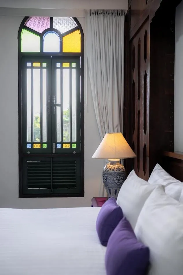 Bed in Cheva Gallery Boutique Hotel