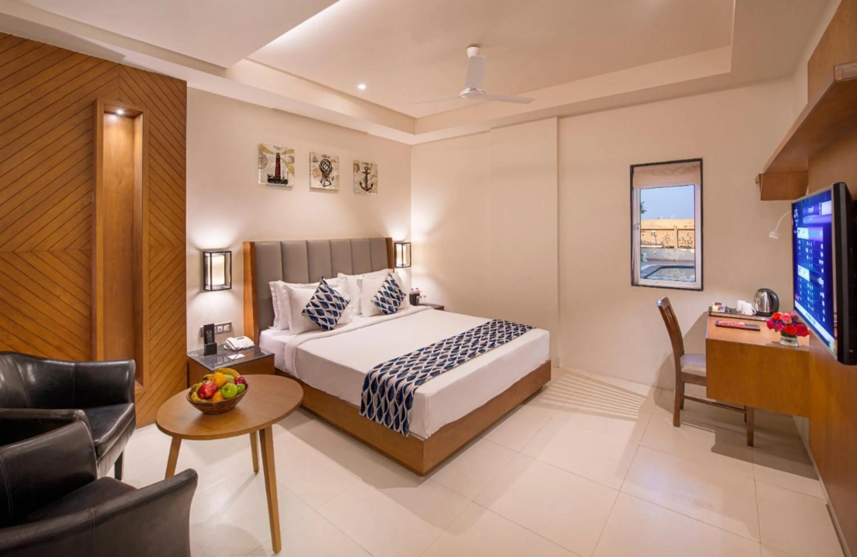 Photo of the whole room, Bed in Lords Inn Jamnagar -Motikhavdi