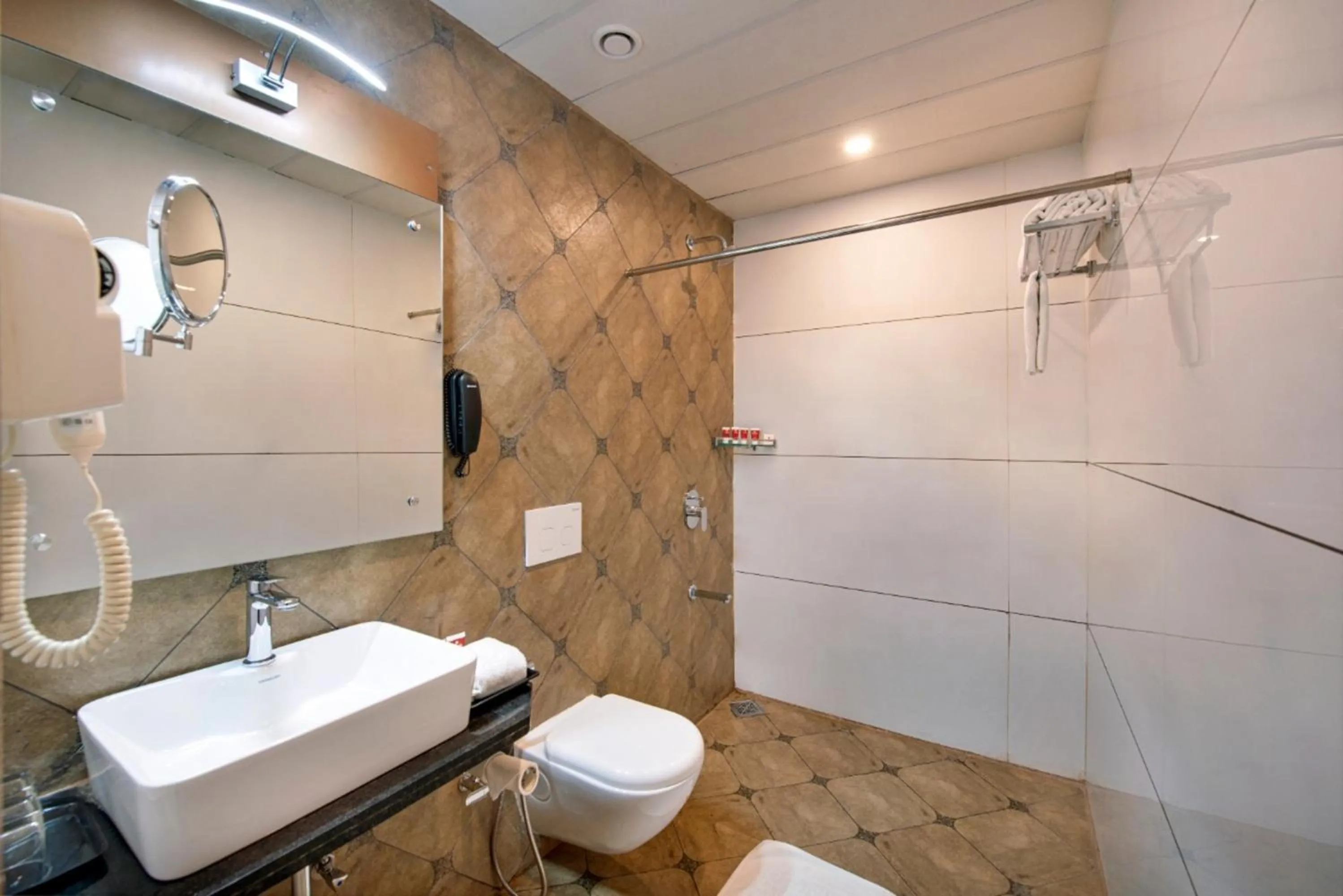 Bathroom in Lords Inn Jamnagar -Motikhavdi