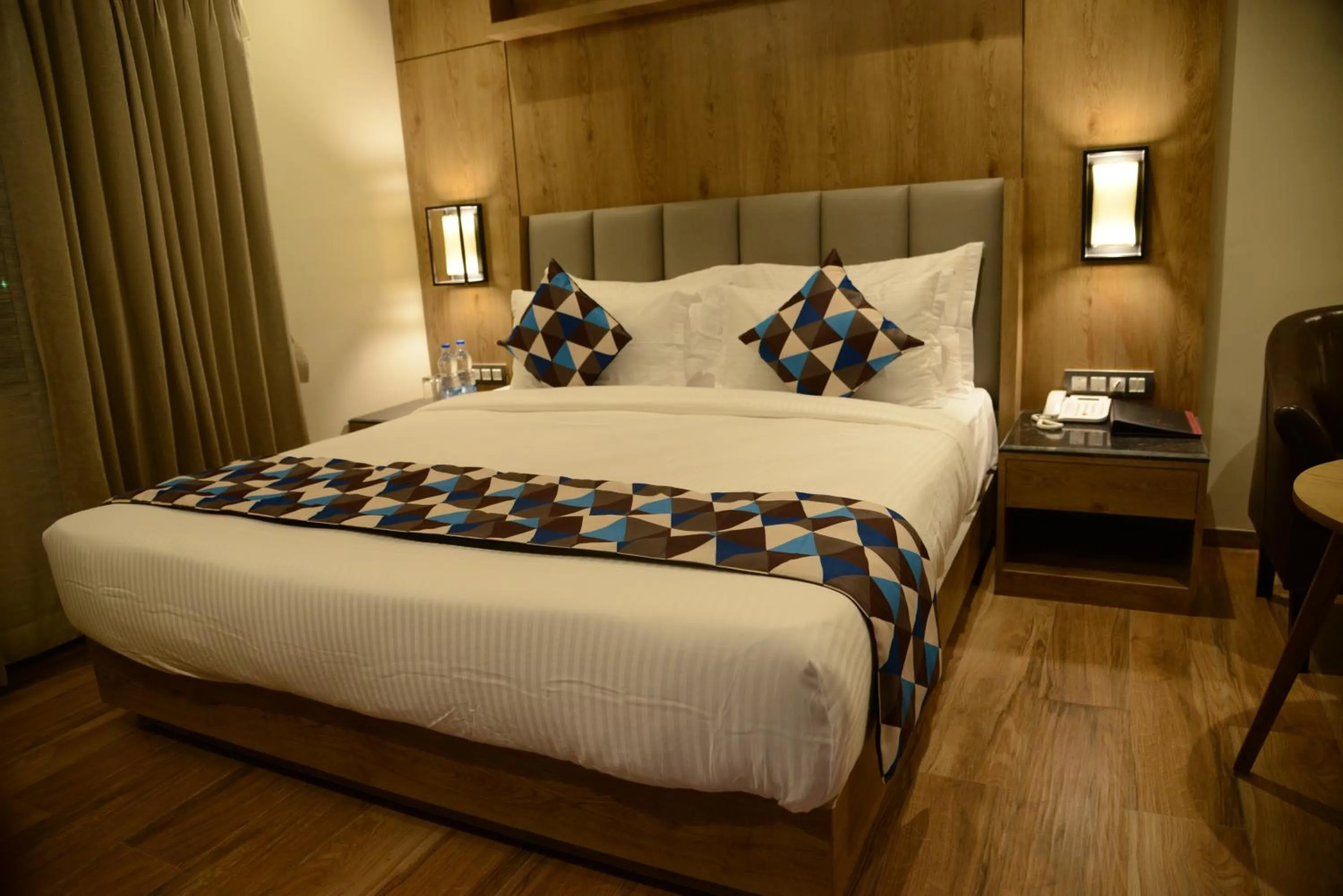 Bedroom, Bed in Lords Inn Jamnagar -Motikhavdi