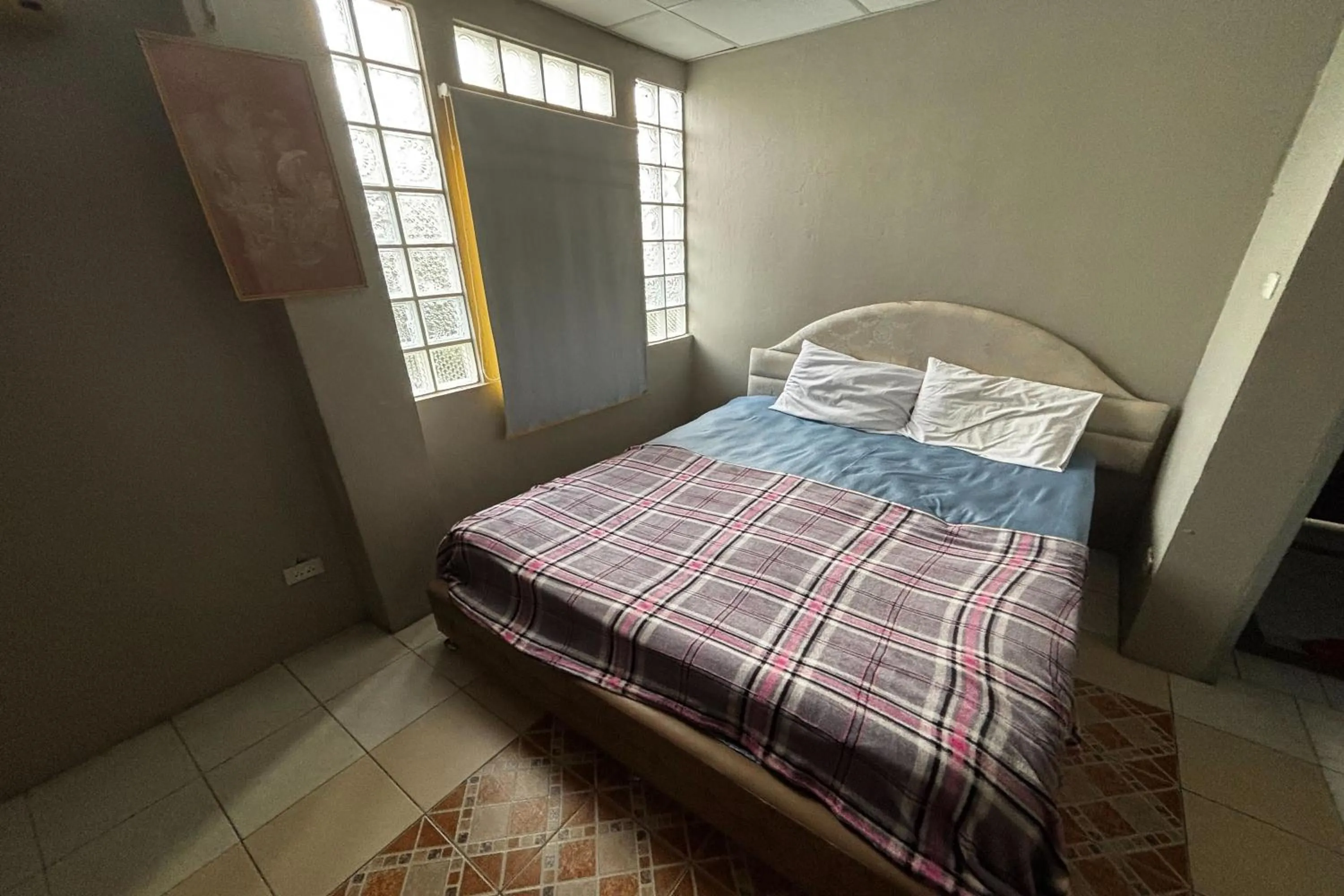 Bed in OYO 457 Panasan Villa