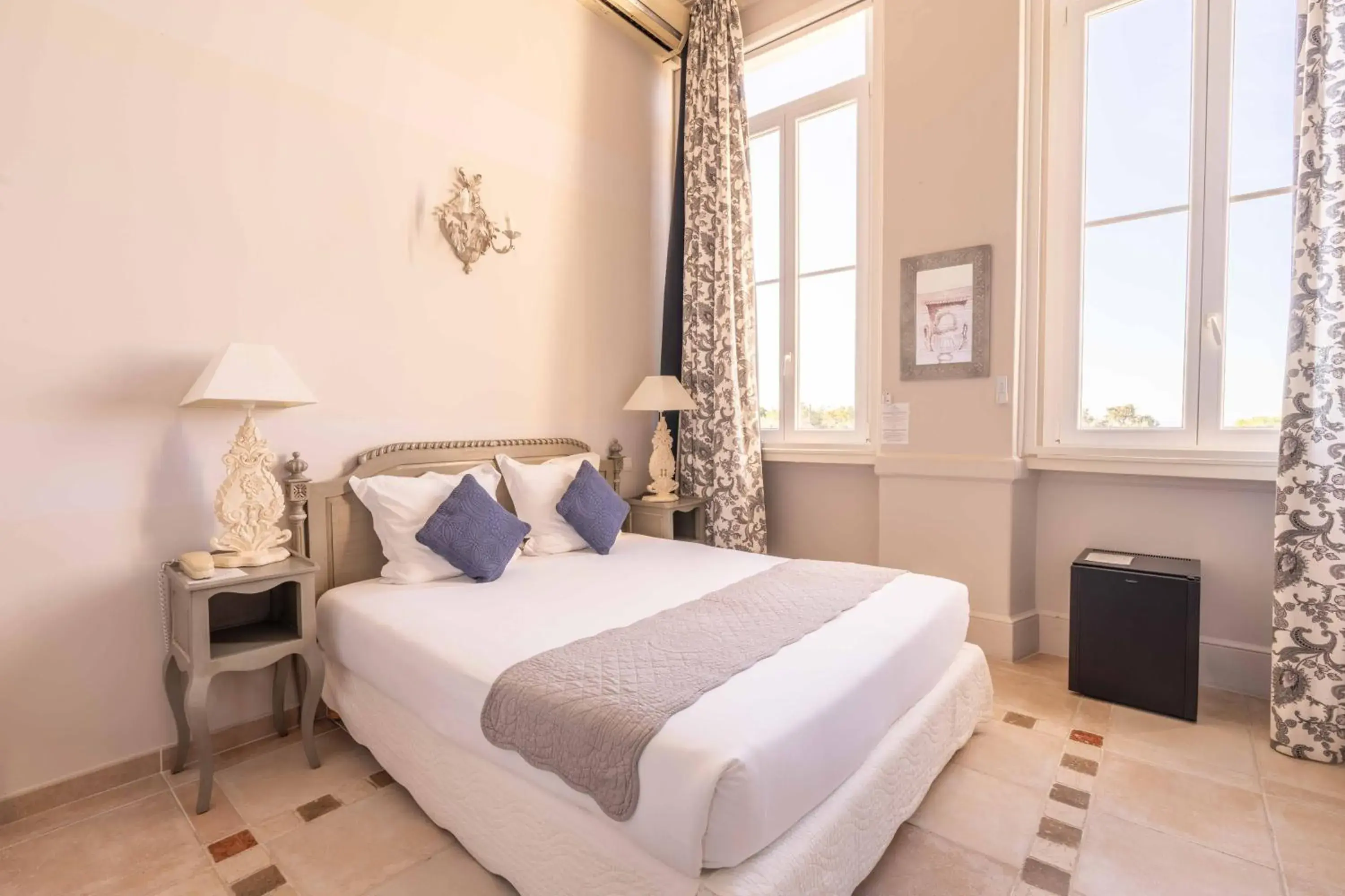 Photo of the whole room in Hôtel l'Orangeraie Photo of the whole room in Hôtel l'Orangeraie