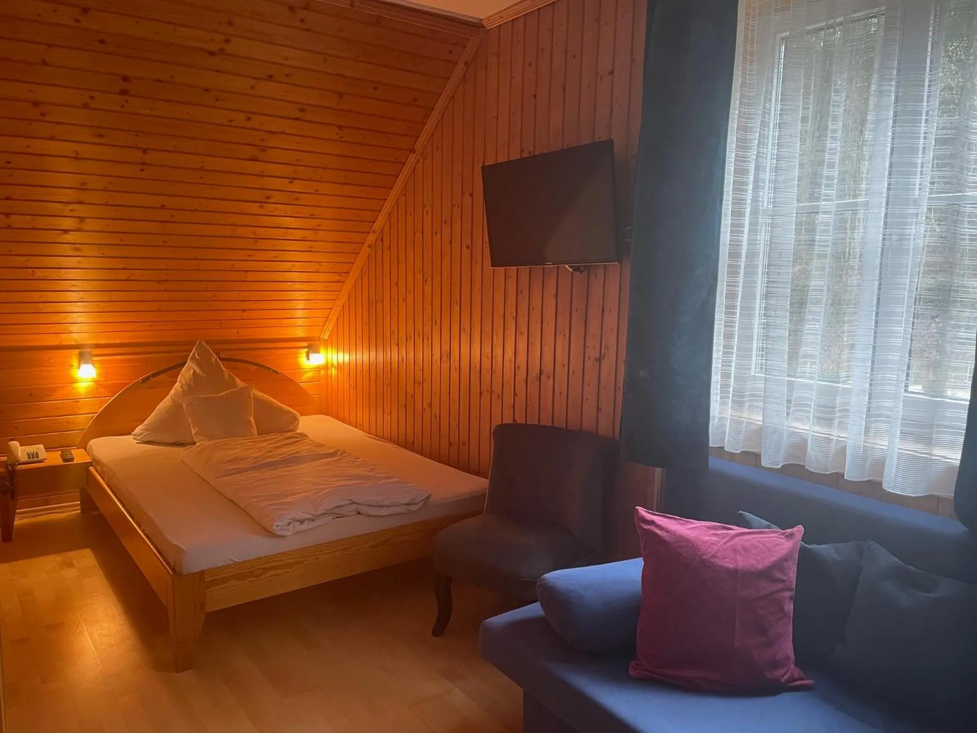 Photo of the whole room, Bed in Gasthof Martinihof