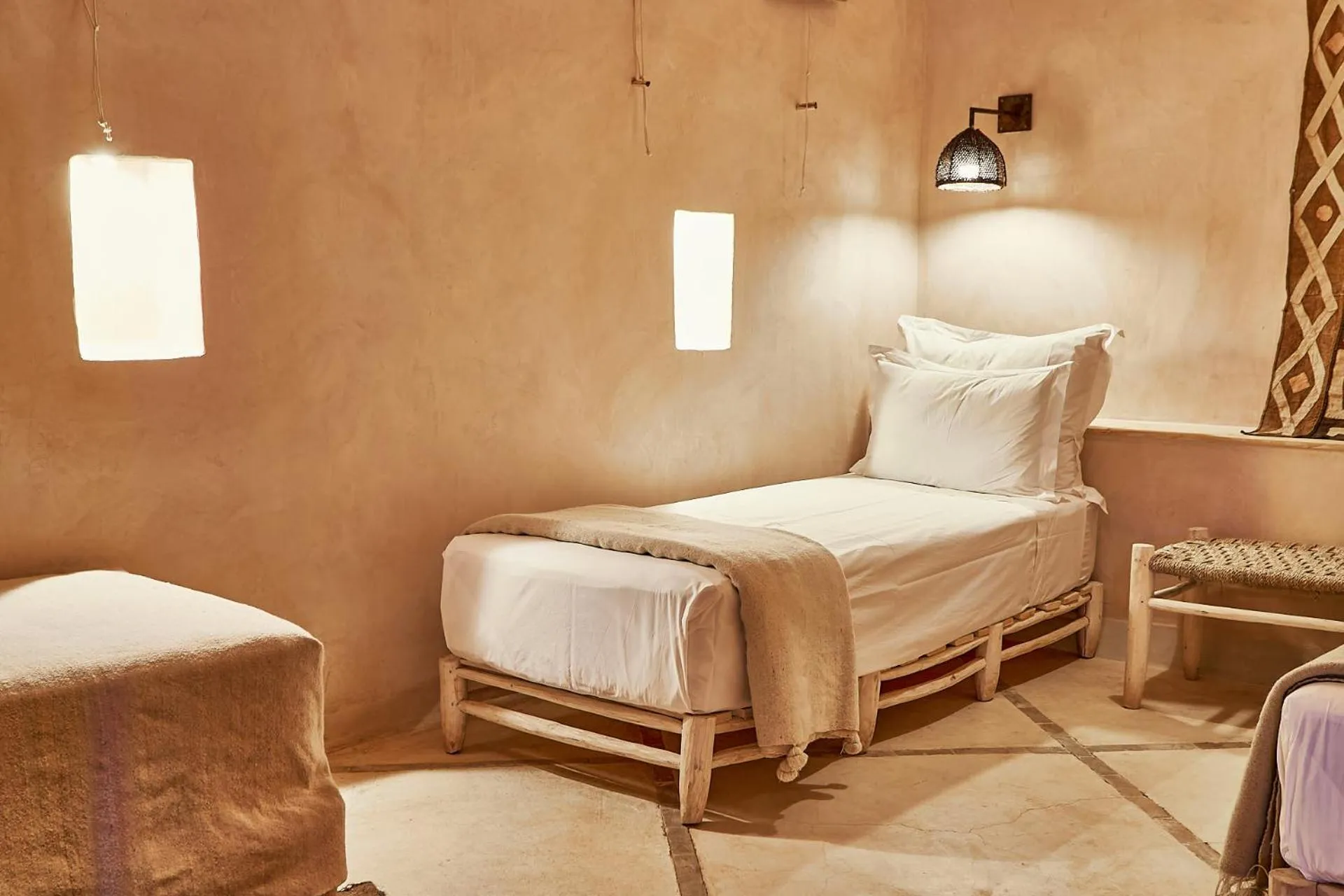 Bed in Riad Caravane
