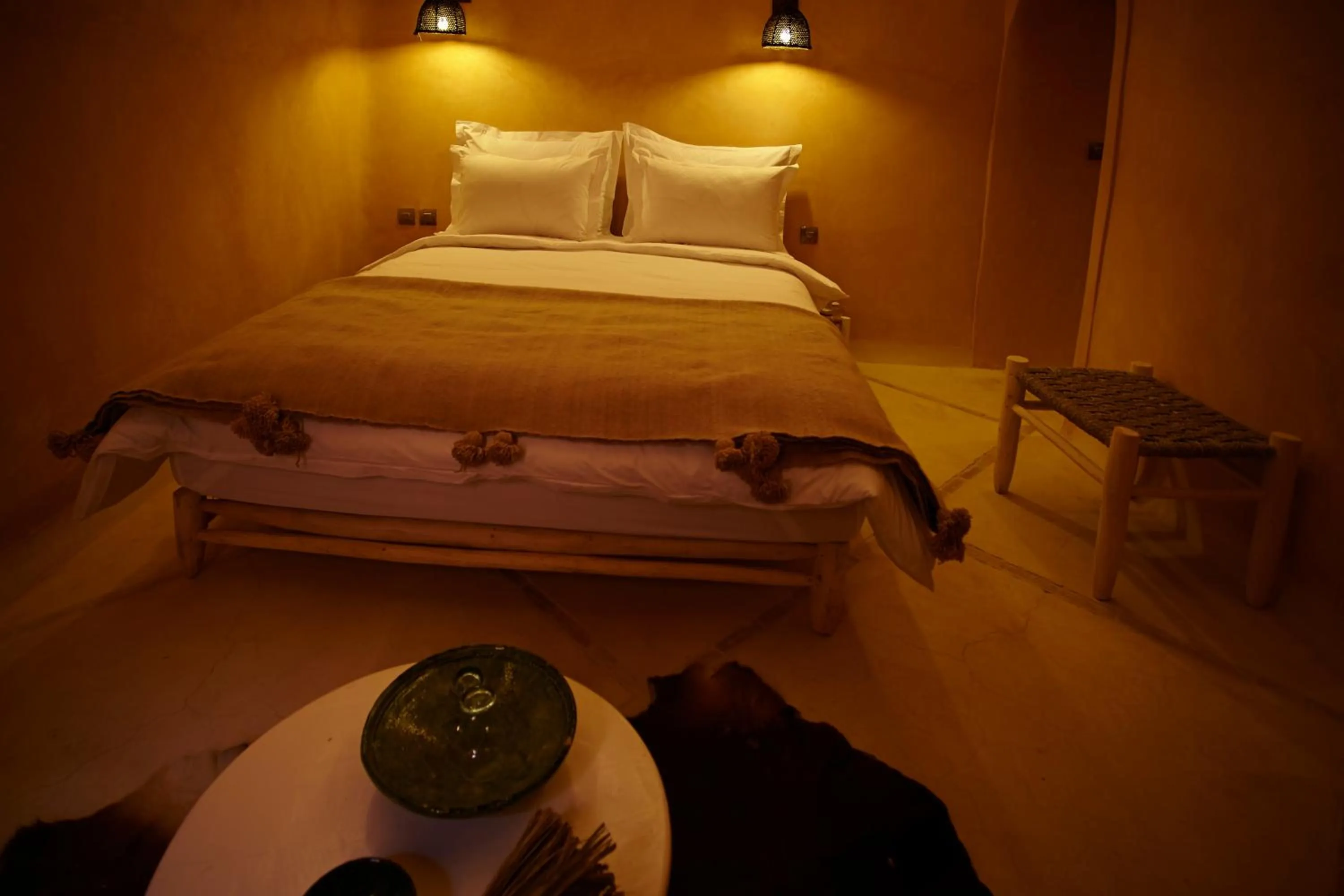 Bed in Riad Caravane