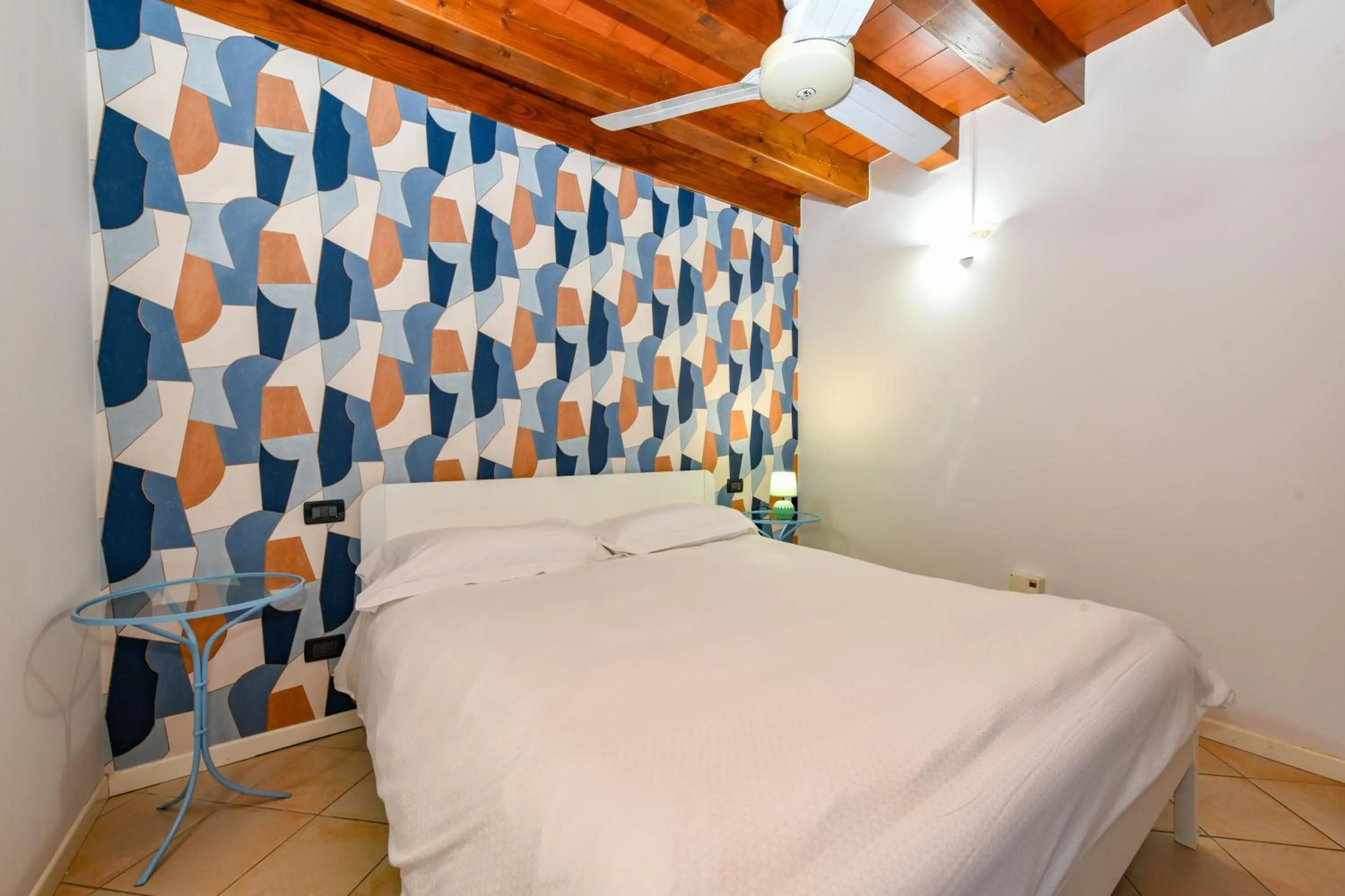 Bedroom, Bed in Flowers Apartments