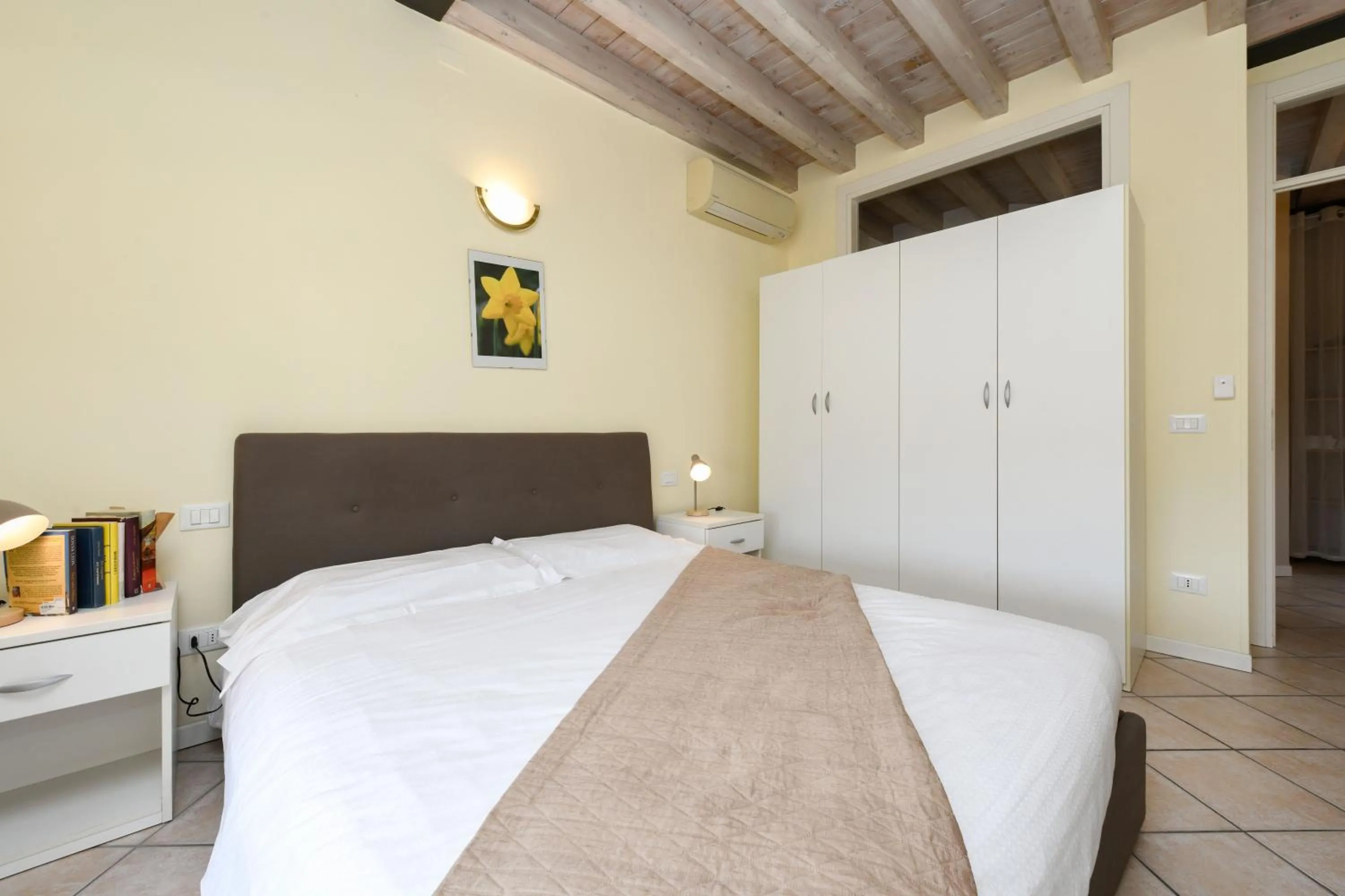 Bedroom, Bed in Flowers Apartments