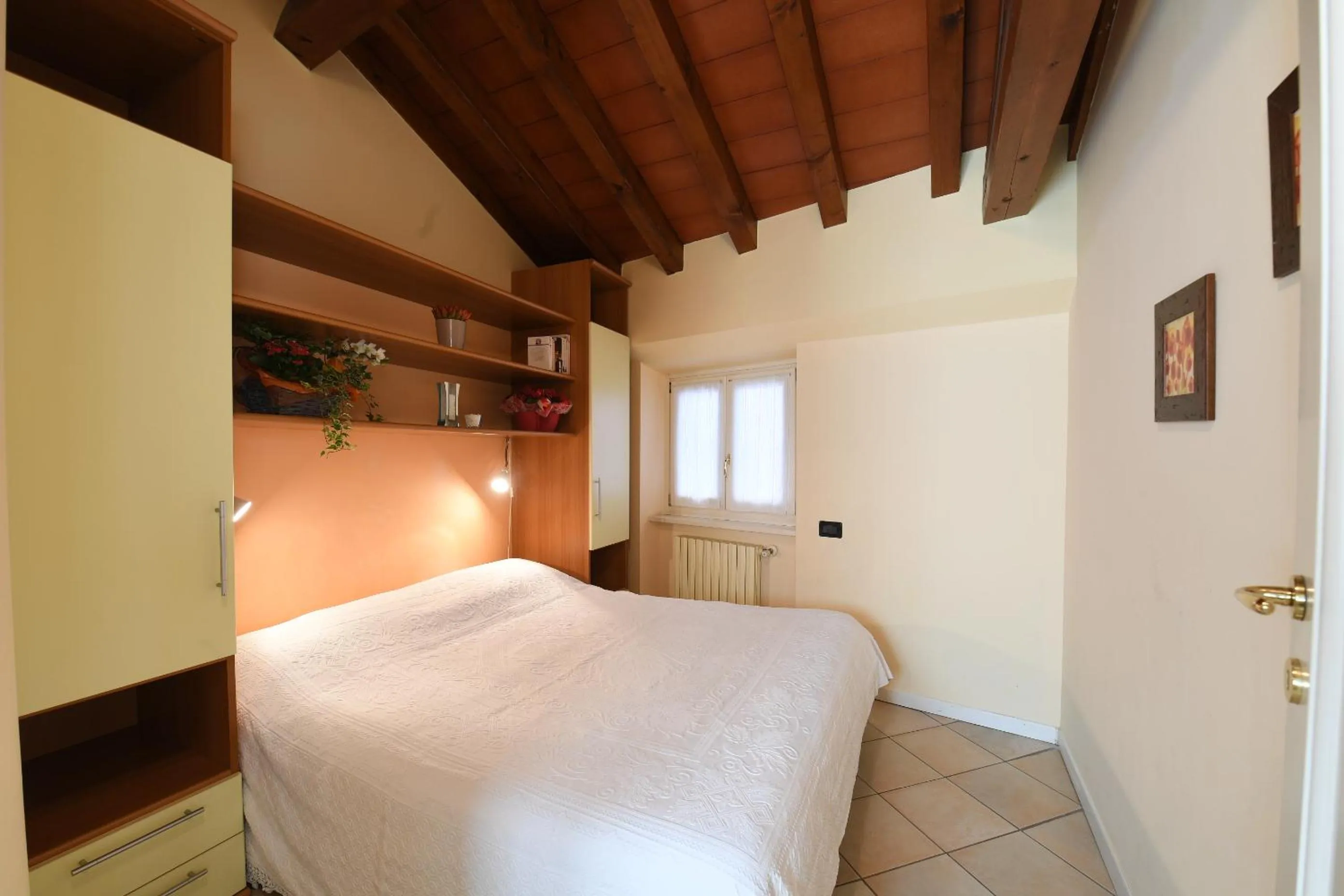 Bedroom, Bed in Flowers Apartments