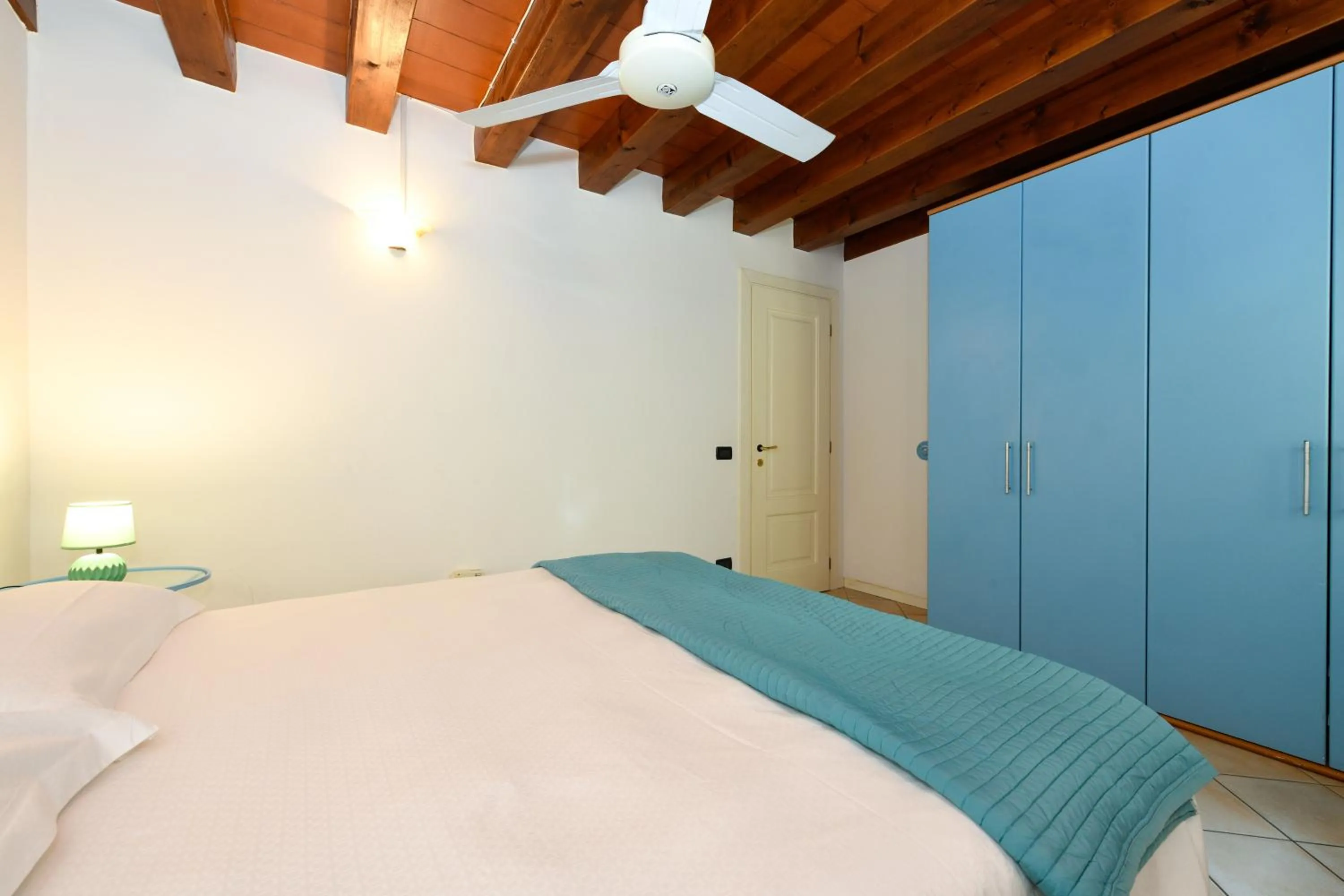 Bedroom, Bed in Flowers Apartments