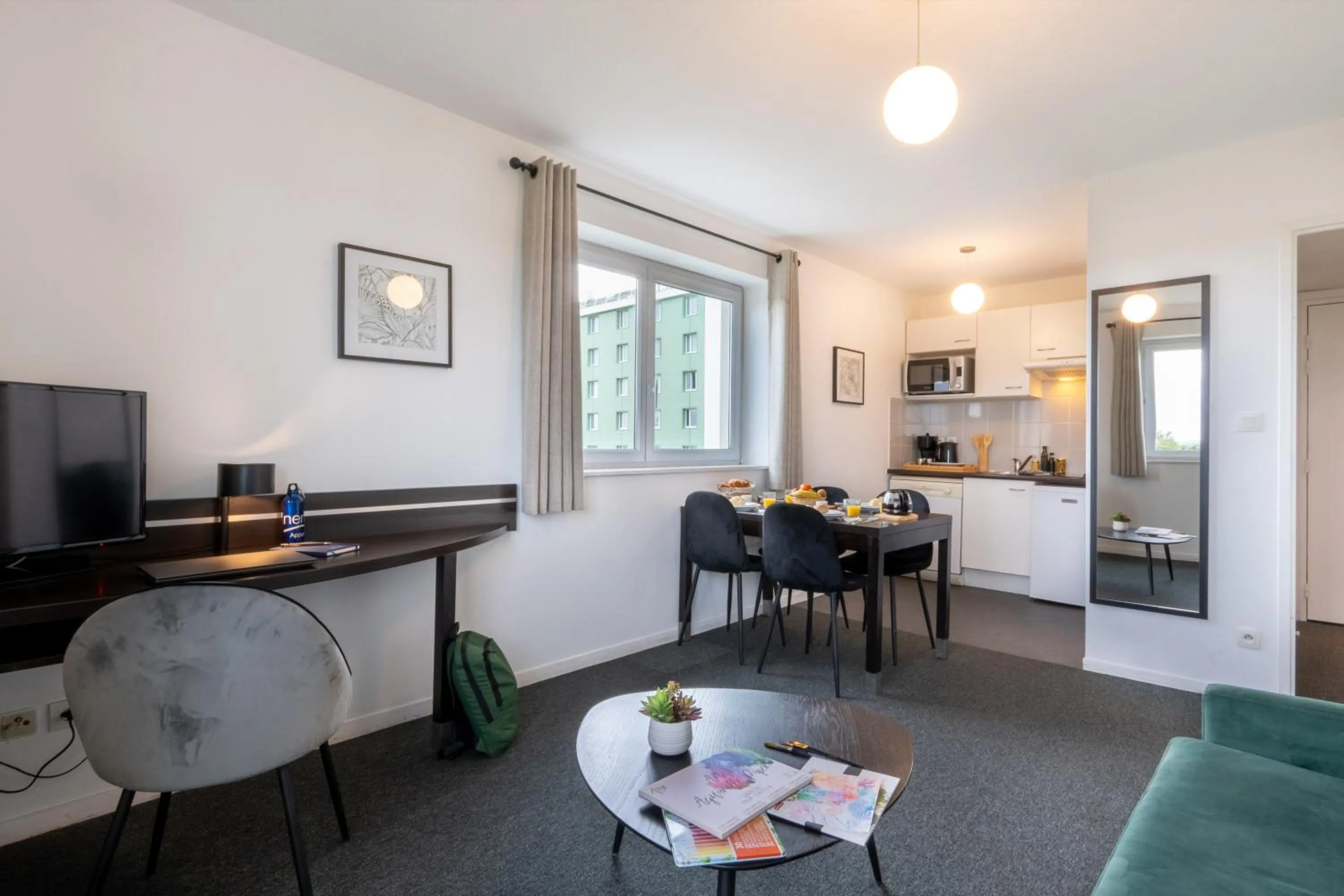 kitchen in Nemea Appart Hotel Toulouse Aéroport