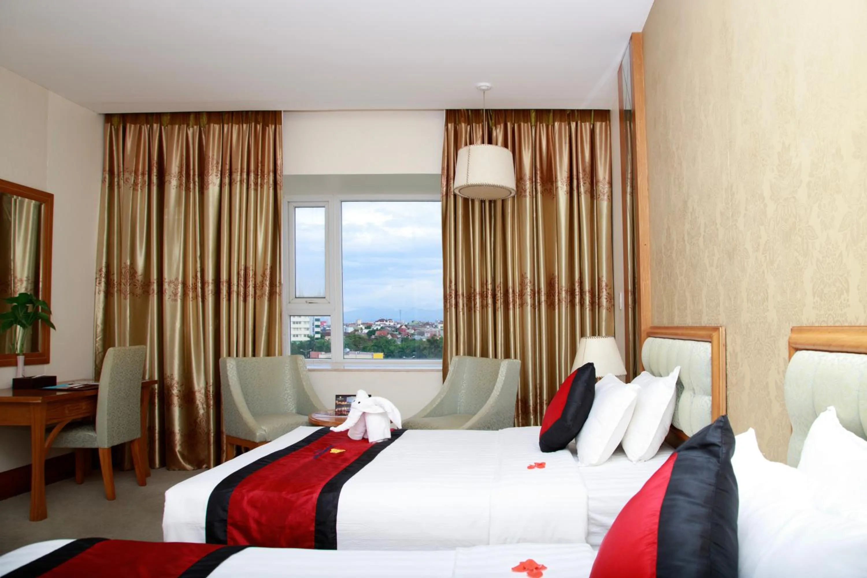 Bed in Sai Gon Dong Ha Hotel - a member of Saigontourist Group