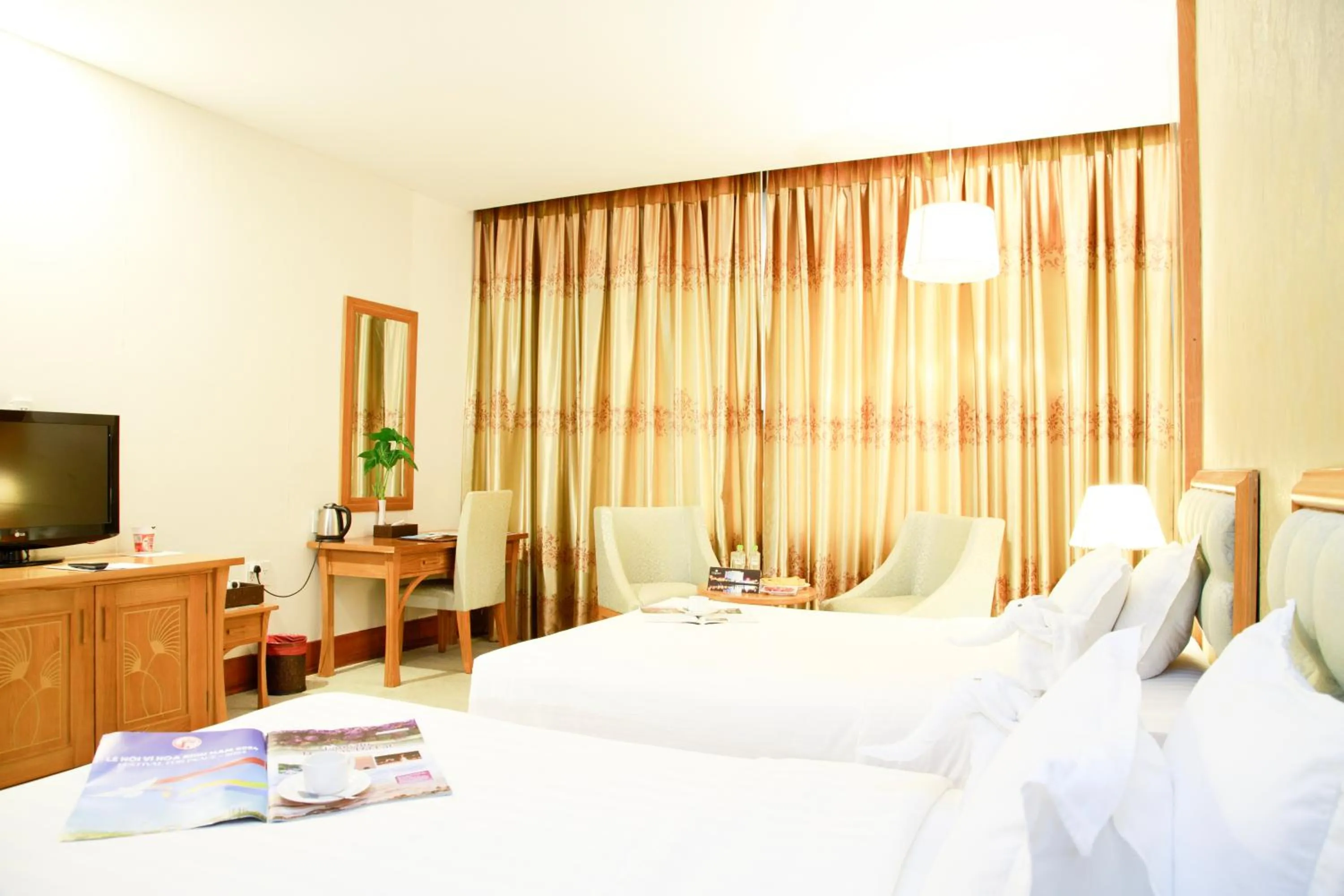 Bed in Sai Gon Dong Ha Hotel - a member of Saigontourist Group