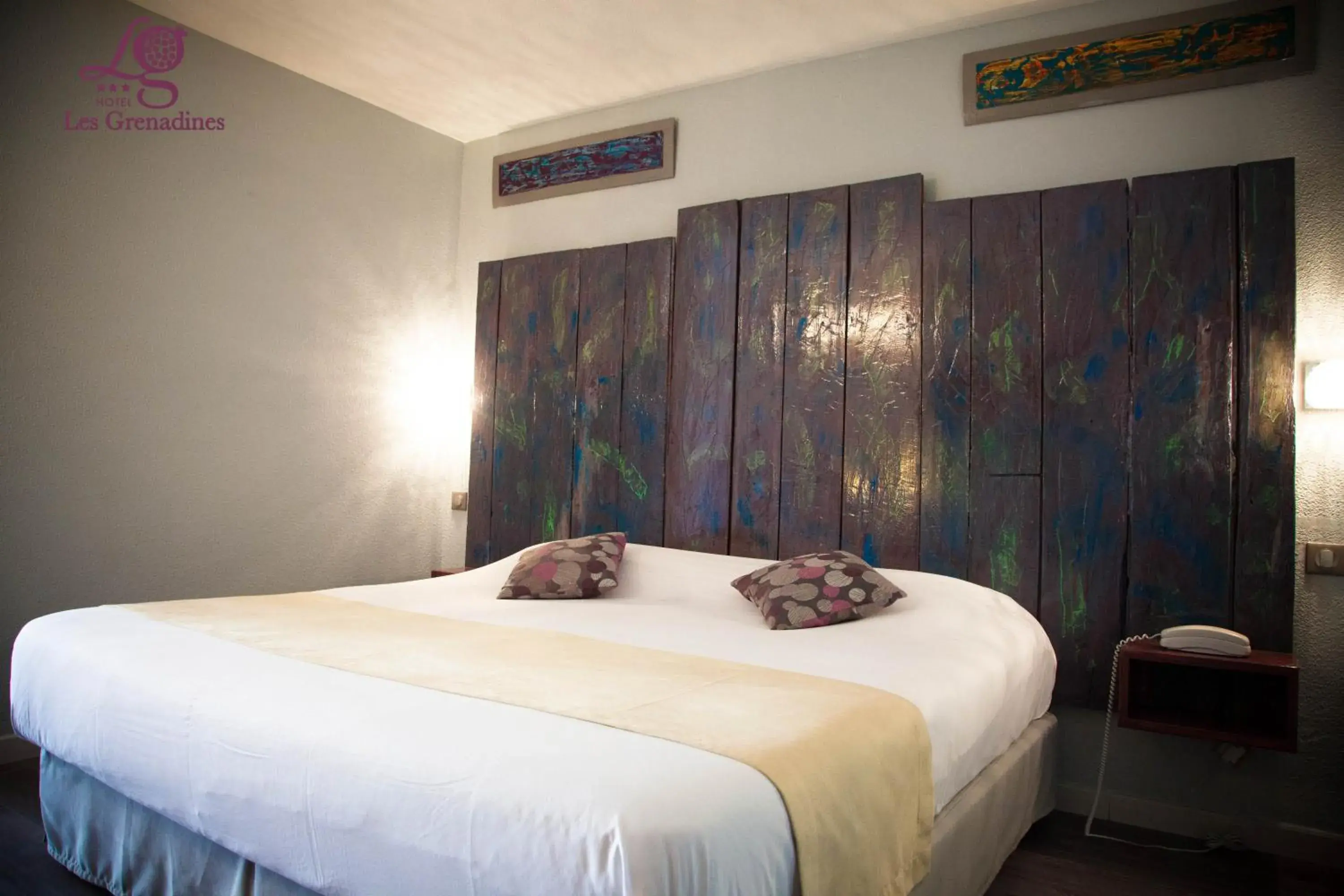 Family Room (2 Adults + 2 Children) in Logis Hôtel Les Grenadines Family Room (2 Adults + 2 Children) in Logis Hôtel Les Grenadines