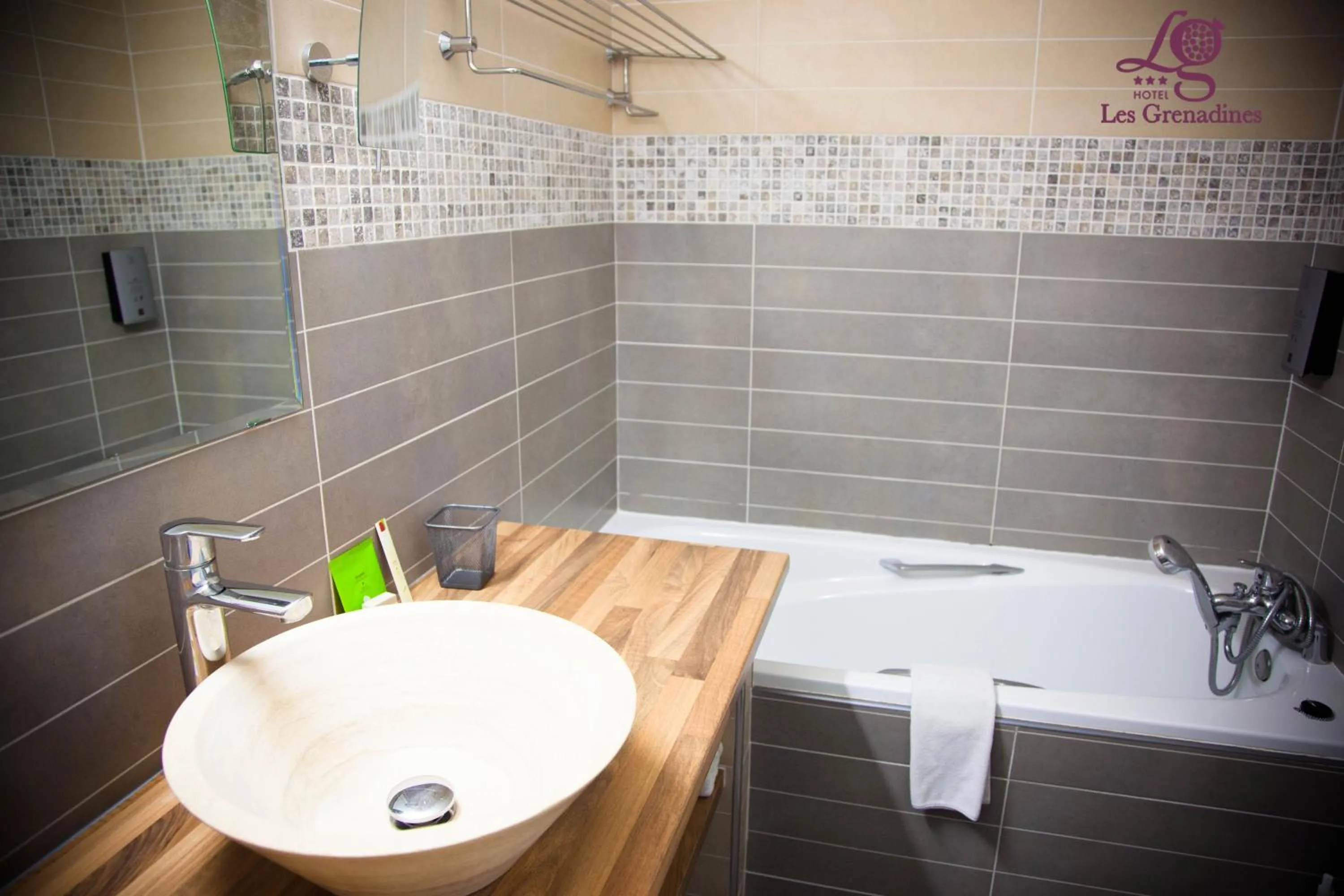 Bathroom in Logis Hôtel Les Grenadines