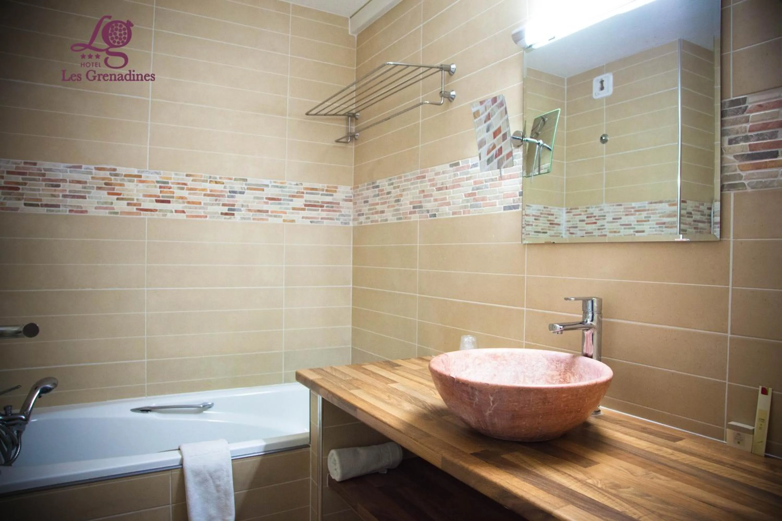 Bathroom in Logis Hôtel Les Grenadines