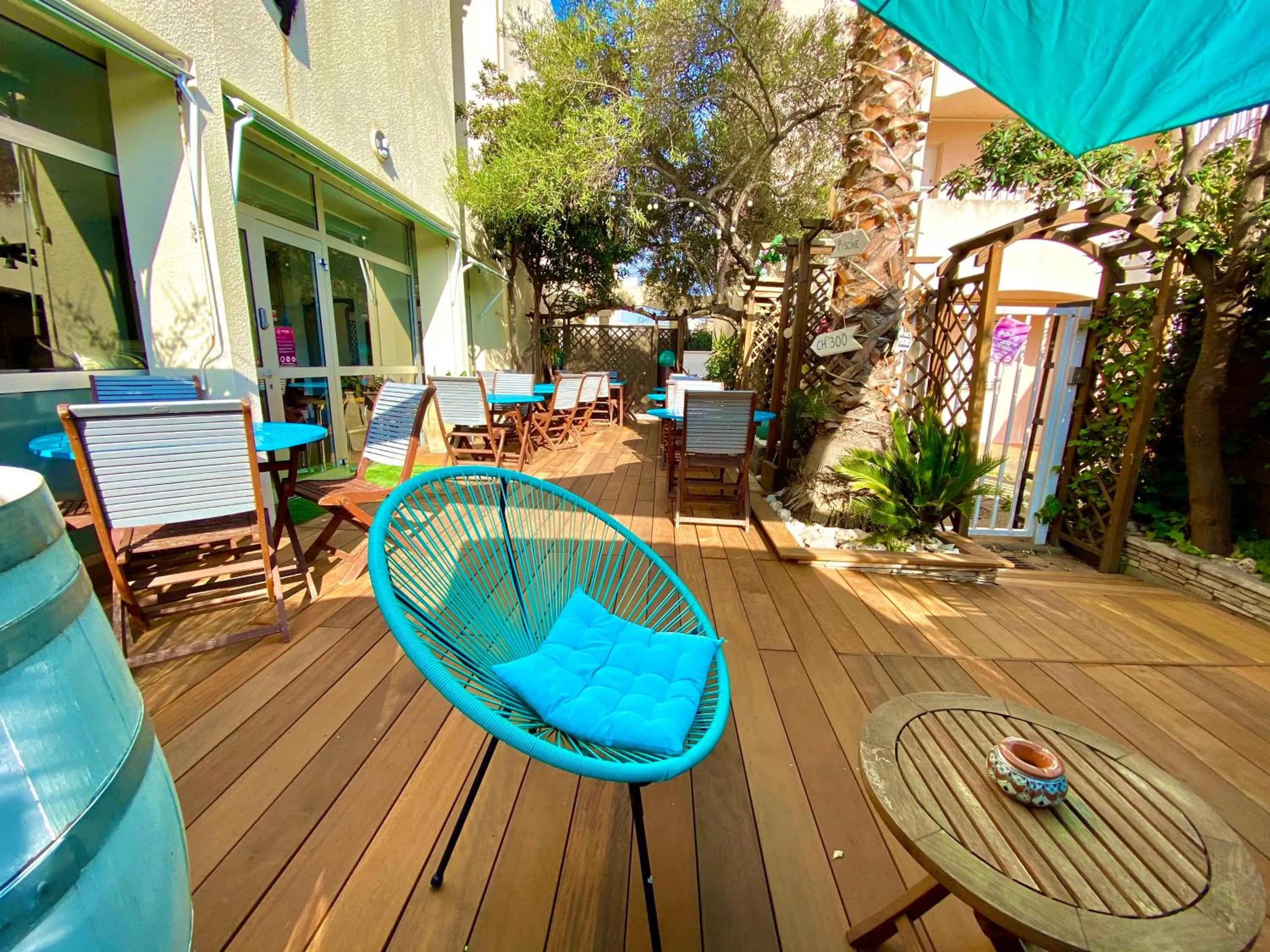 Patio in Logis Hôtel Les Grenadines