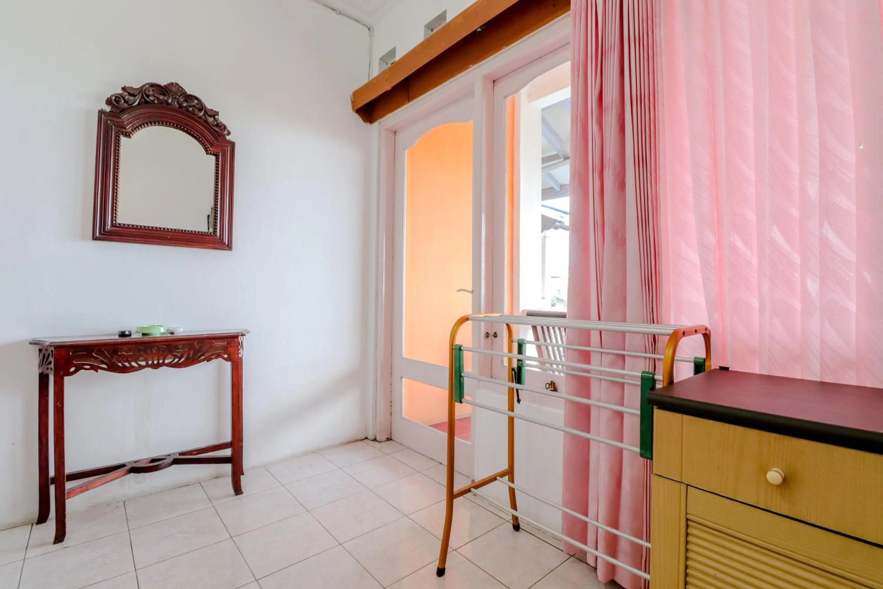 Bedroom in Adinda Beach Hotel and Villa