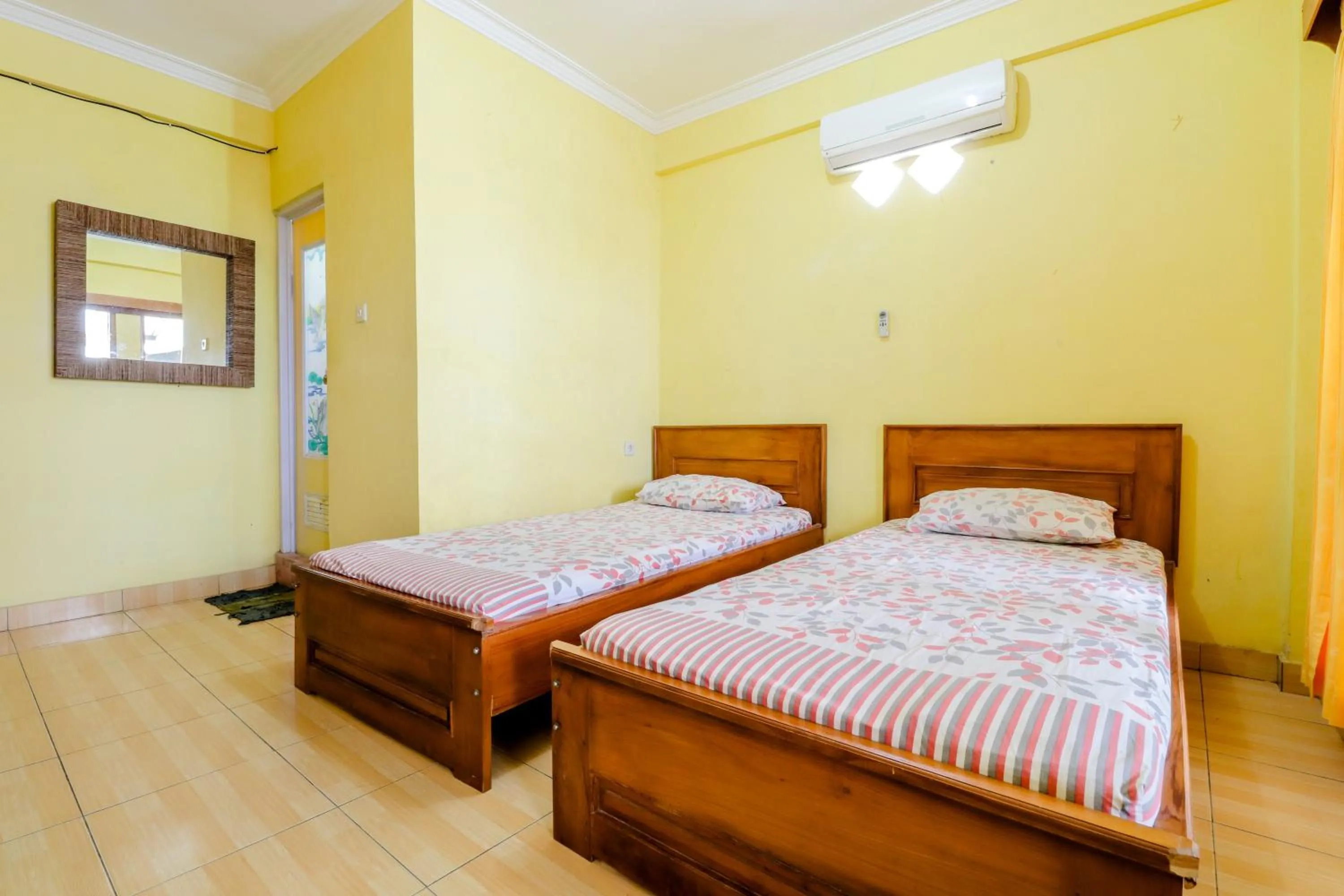 Bedroom, Bed in Adinda Beach Hotel and Villa