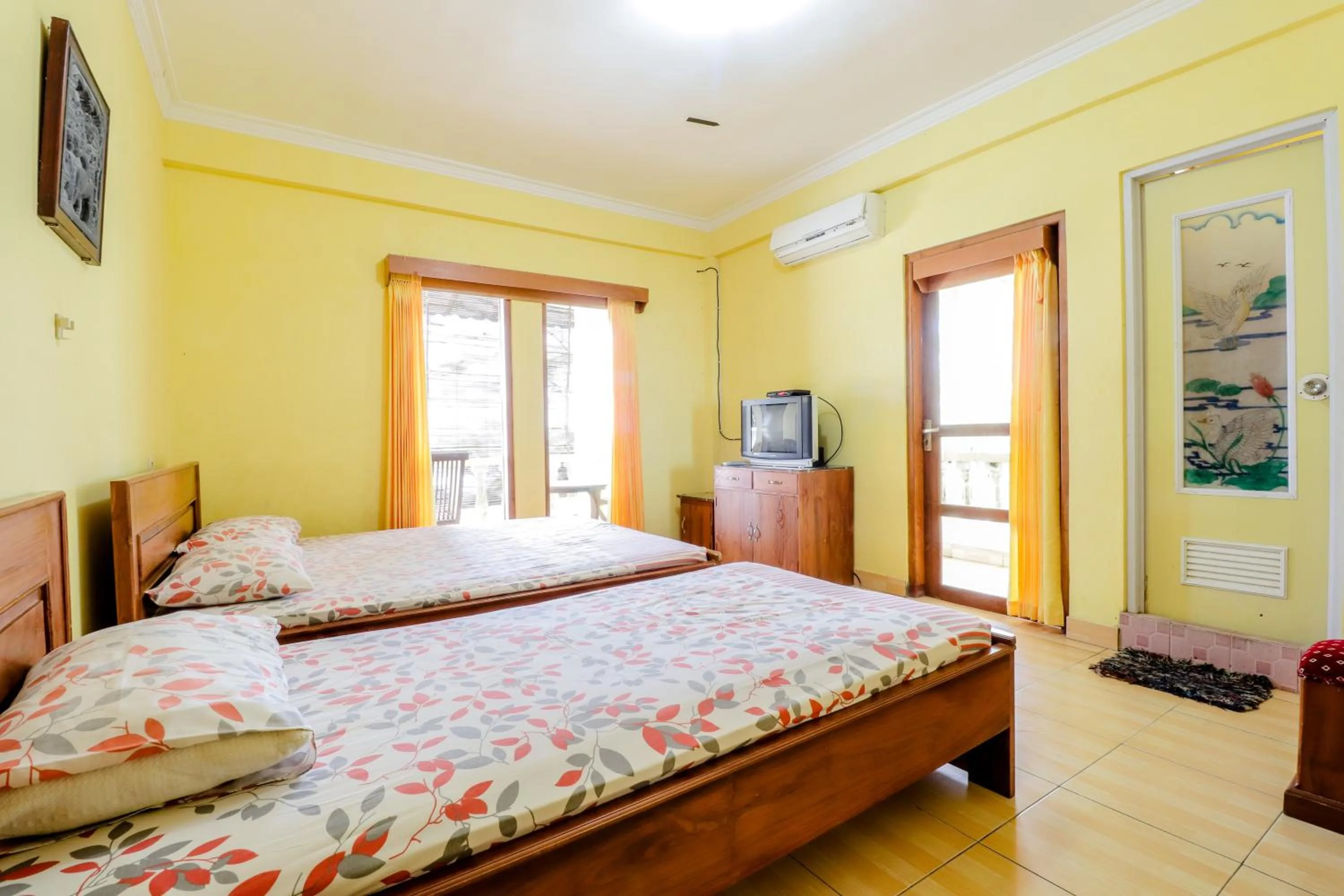 Bedroom, Bed in Adinda Beach Hotel and Villa