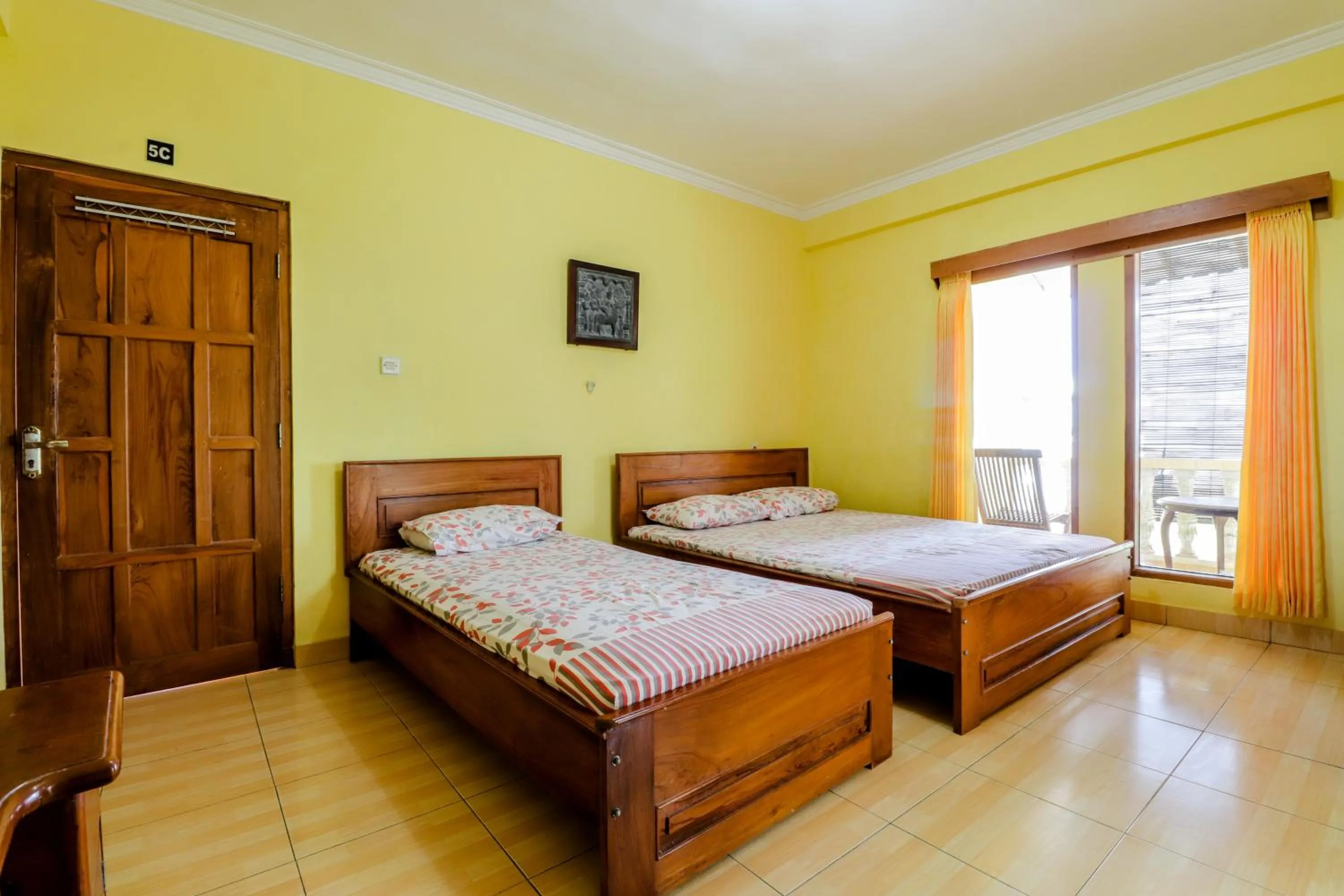 Bedroom, Bed in Adinda Beach Hotel and Villa