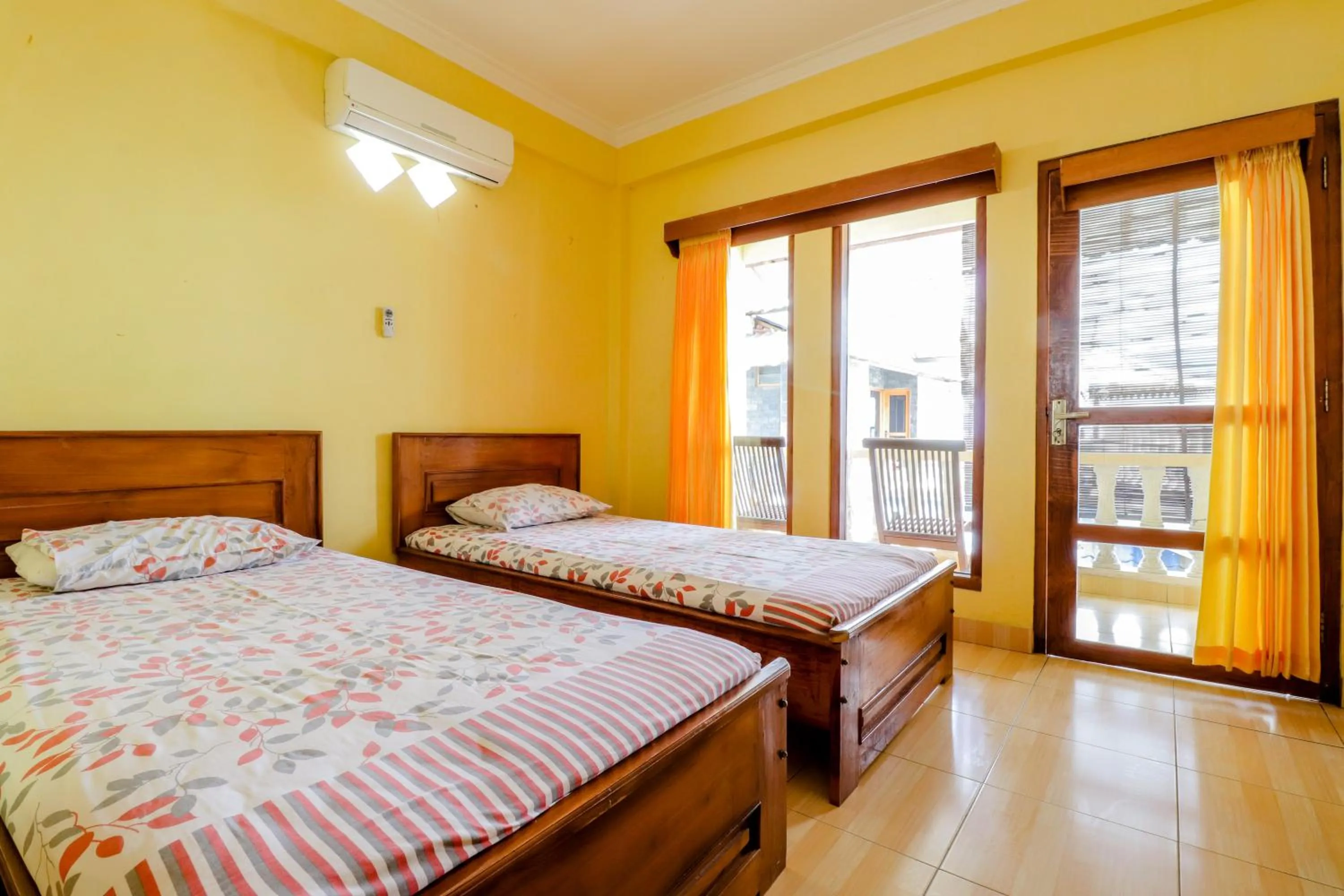 Bedroom, Bed in Adinda Beach Hotel and Villa