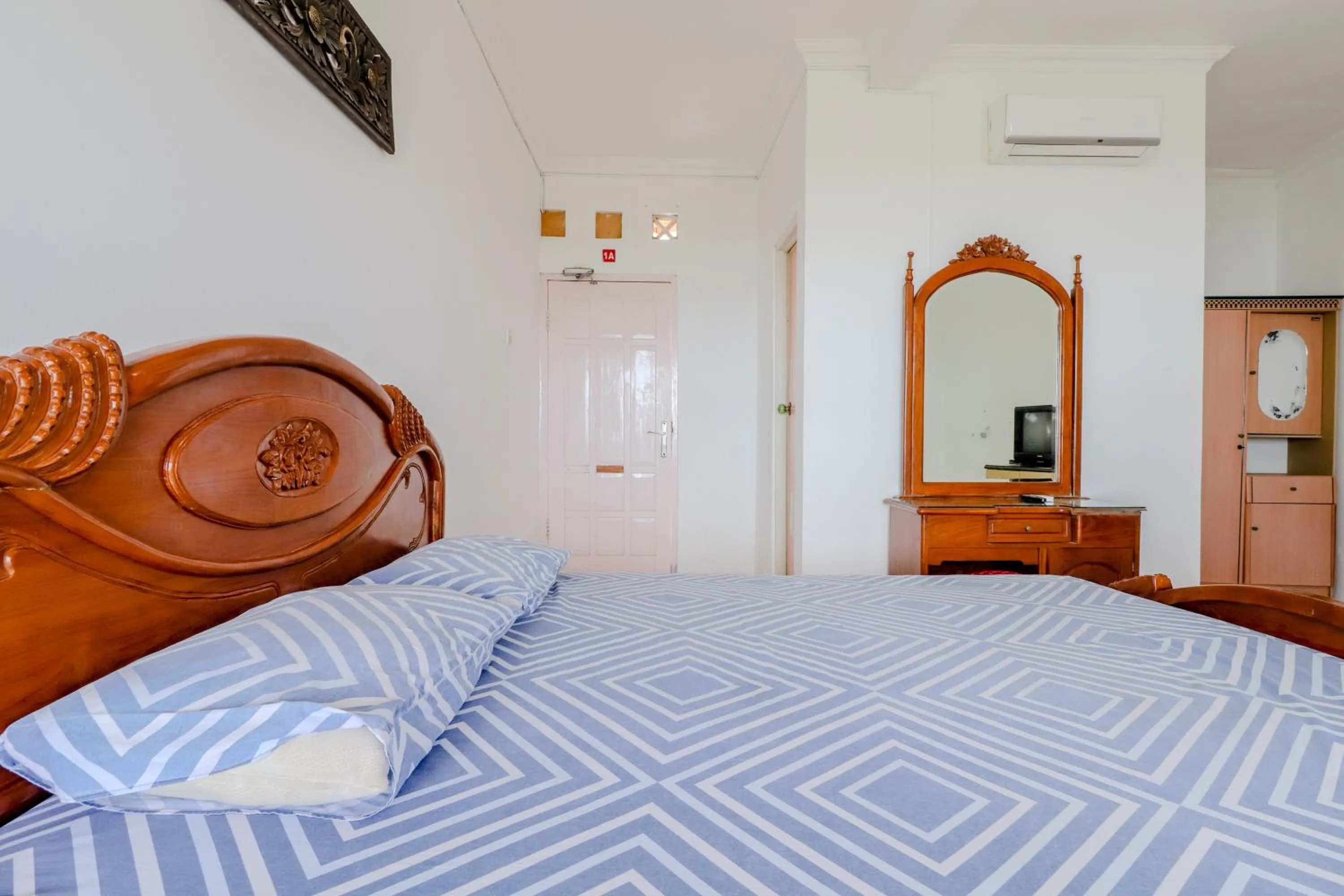 Bedroom, Bed in Adinda Beach Hotel and Villa