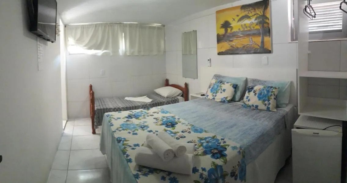 Bed in Pousada Recanto do Sol e Mar