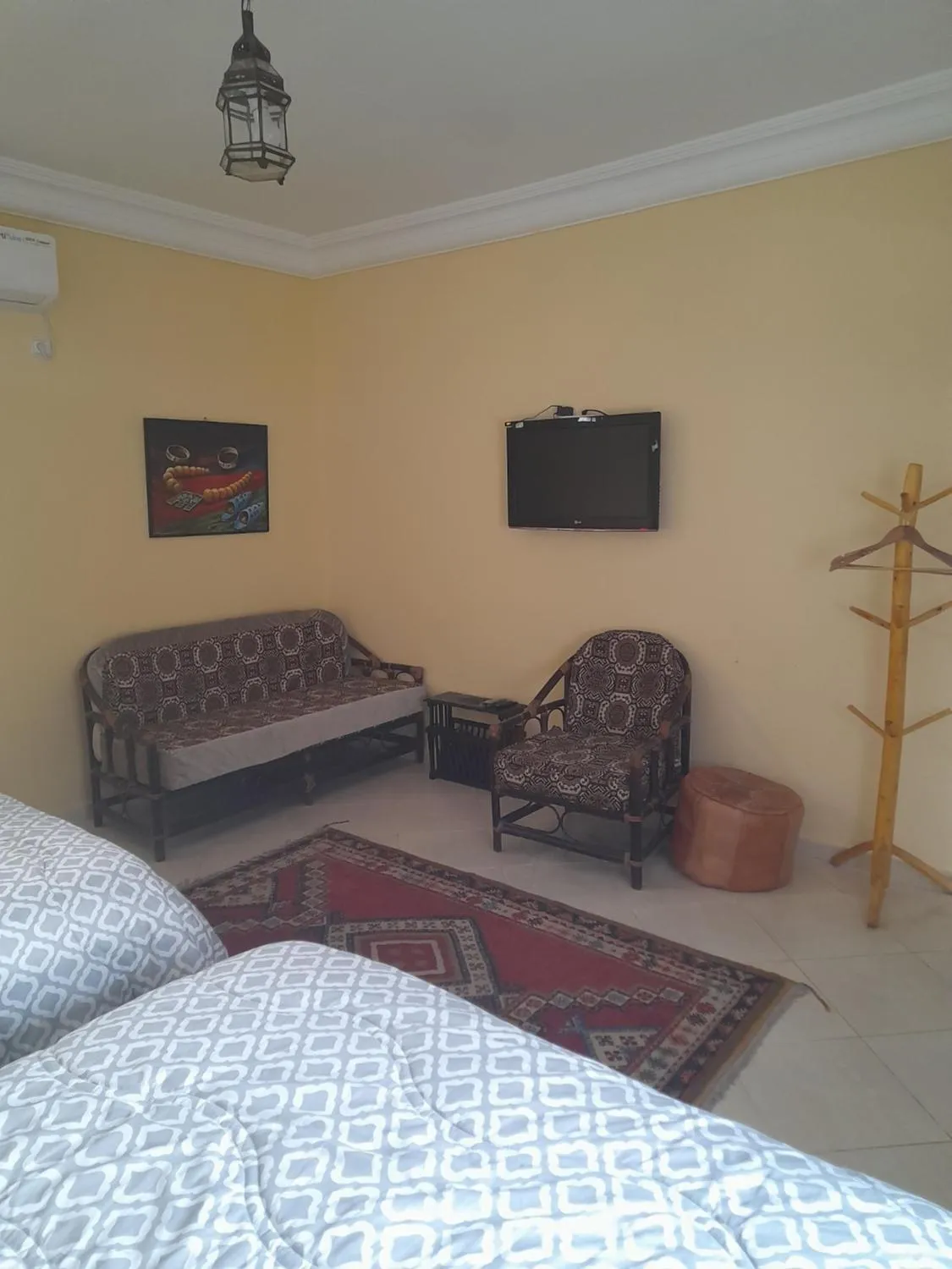 Seating area, Bed in Riad TANJIL