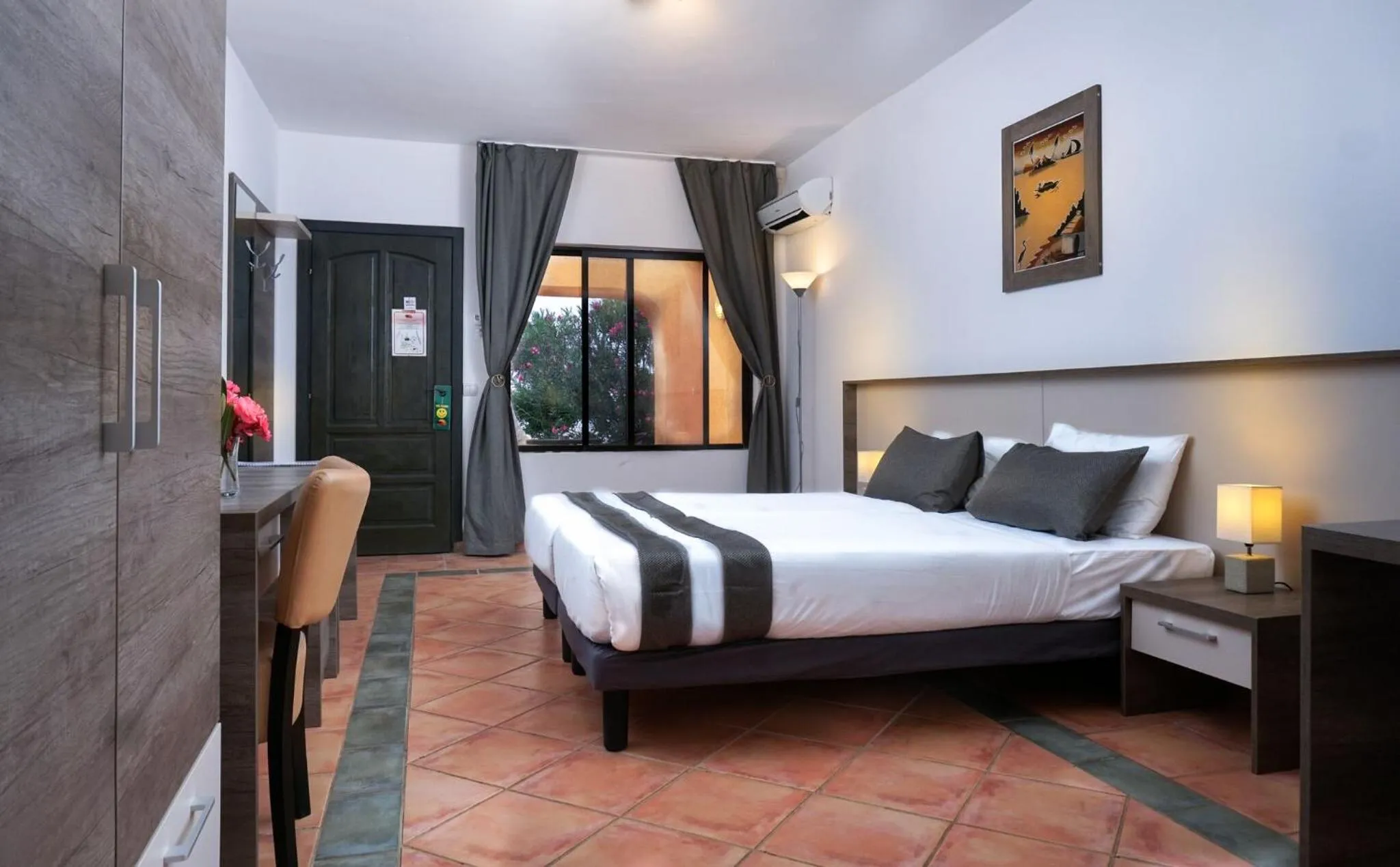 Bed in Sunbeach Hotel & Resort