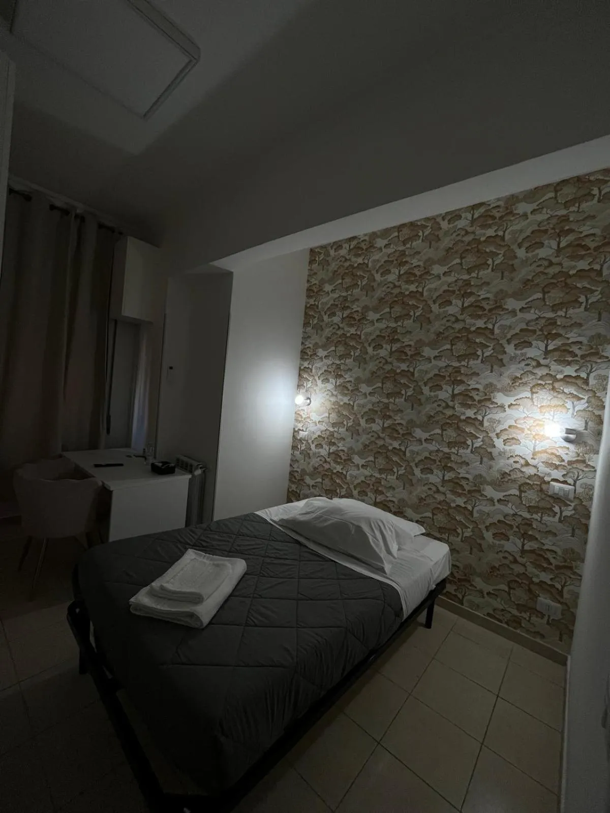 Bed in TIBURTINA INN GUEST HOUSE