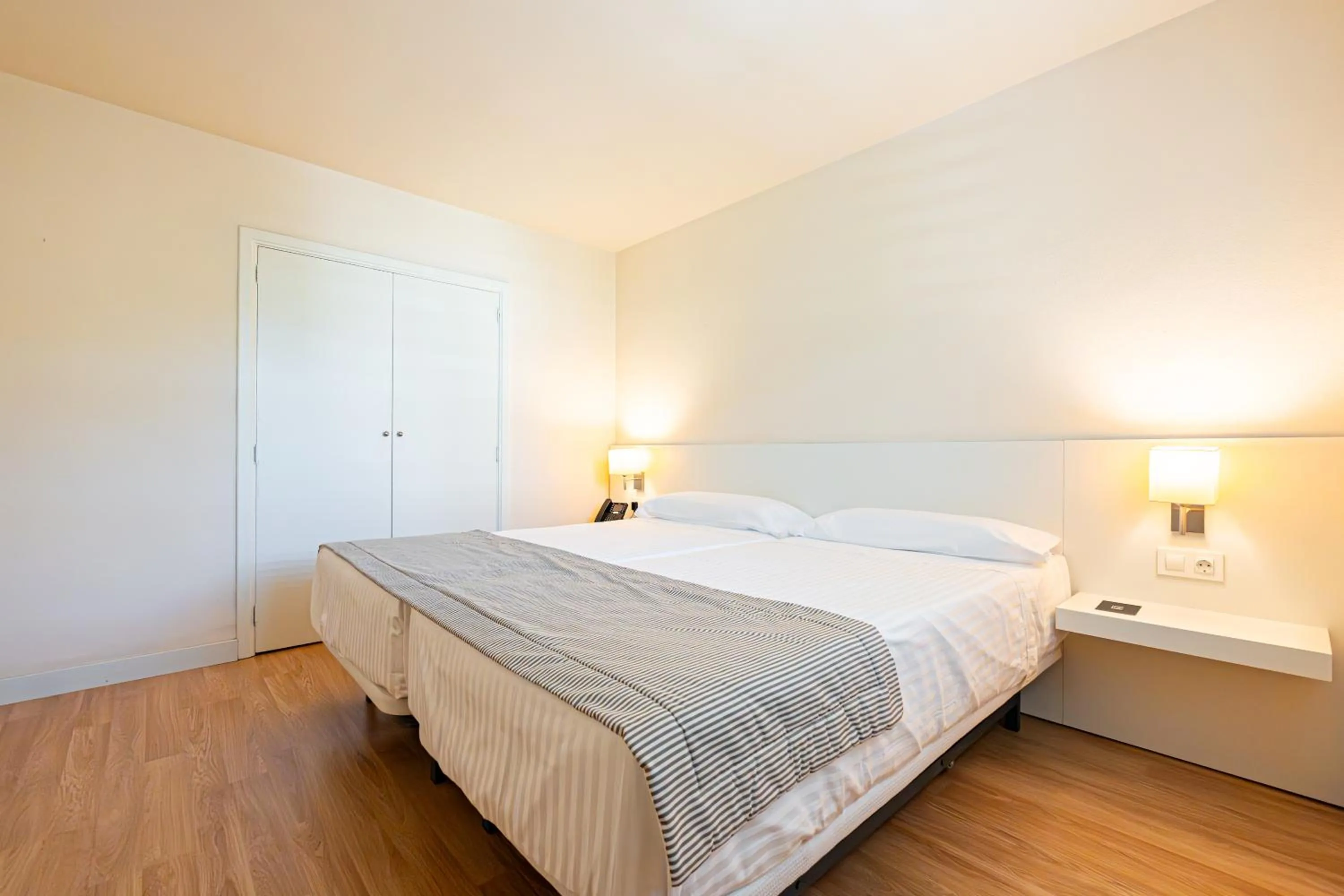 Bedroom, Bed in Hotel Rosella affiliated by Intelier