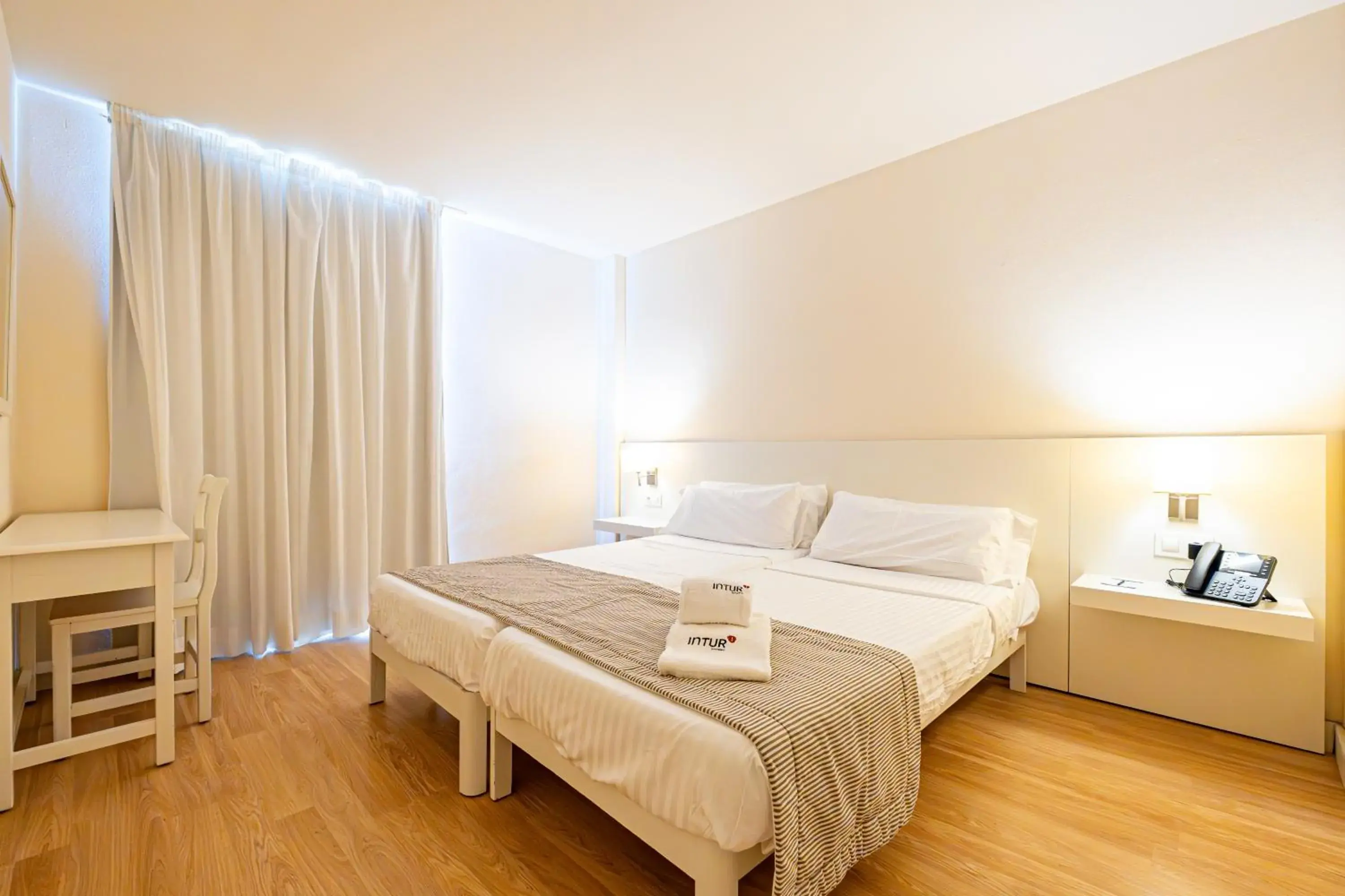 Bed in Hotel Rosella affiliated by Intelier Bed in Hotel Rosella affiliated by Intelier