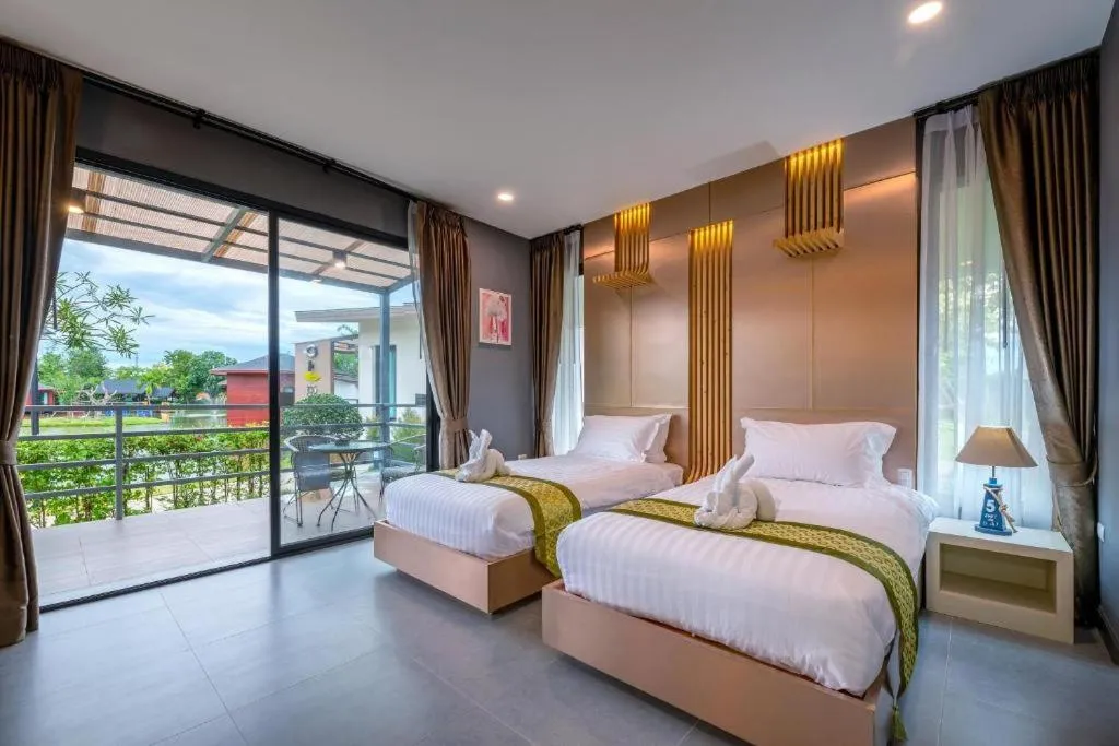 Bed in Boat House Boutique Riverside