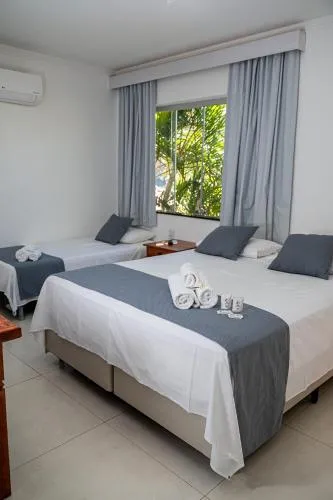 Bed in Pousada do Rio Turvo