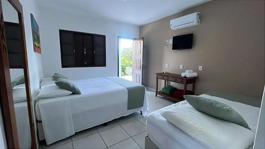 Bed in Pousada do Rio Turvo