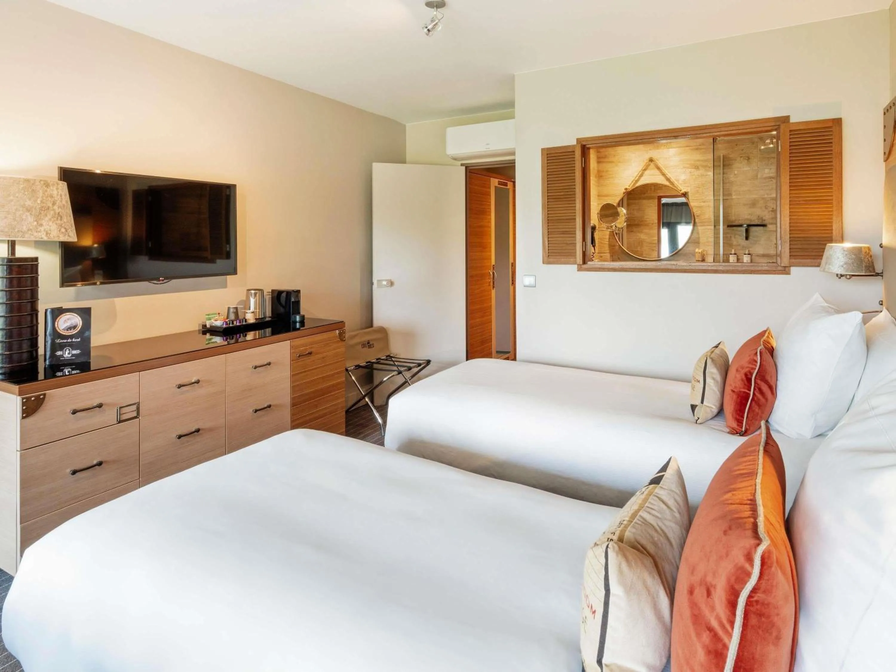 Bedroom, Bed in Côte Ouest Thalasso & Spa Les Sables d'Olonne - MGallery Collection